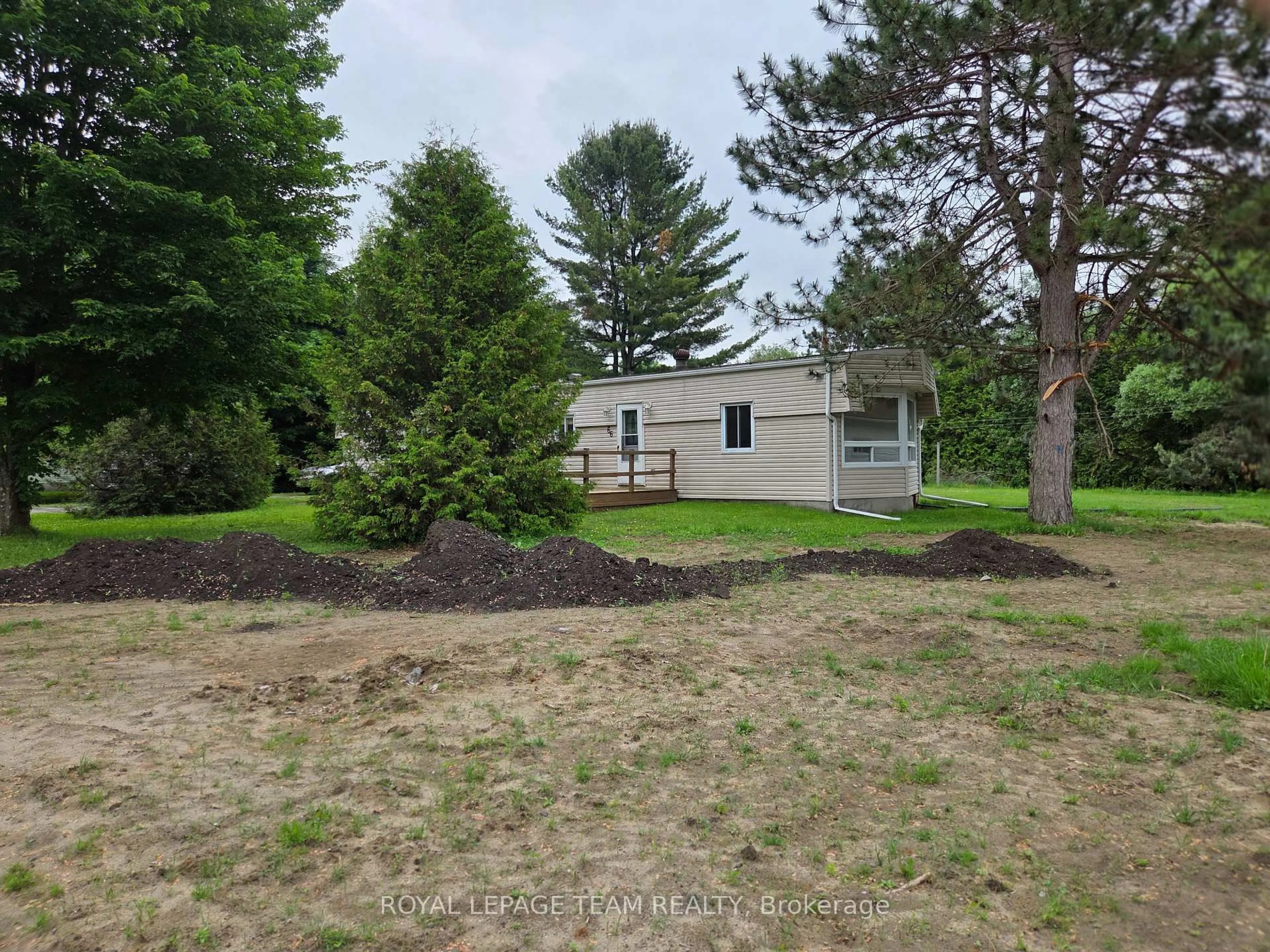 A pic from outside/outdoor area/front of a property/back of a property/a pic from drone, unknown for 5620 Rockdale Rd #66, Vars Ontario K0A 3H0