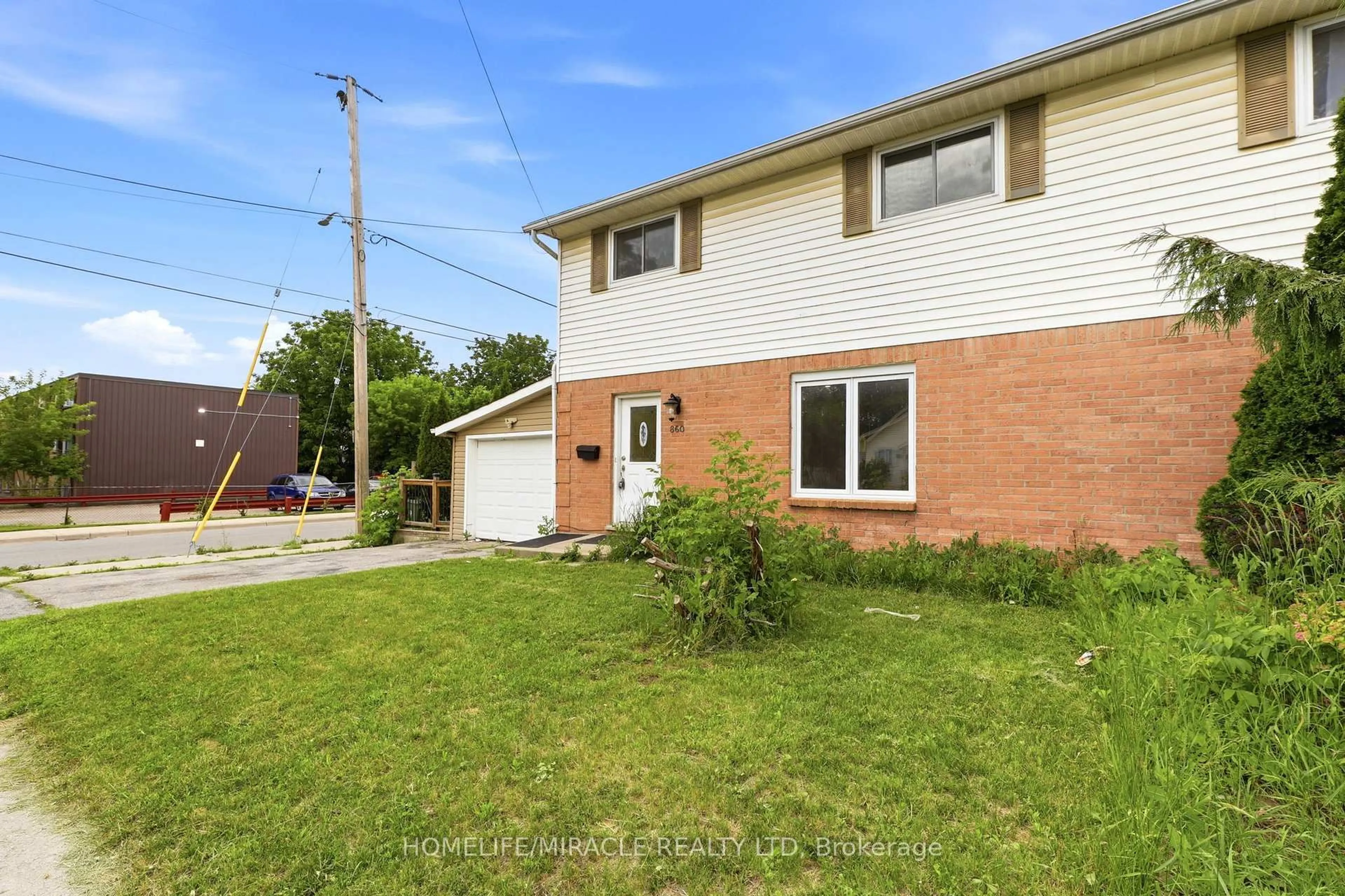 Home with brick exterior material, street for 860 Trafalgar St, London East Ontario N5Z 4W4