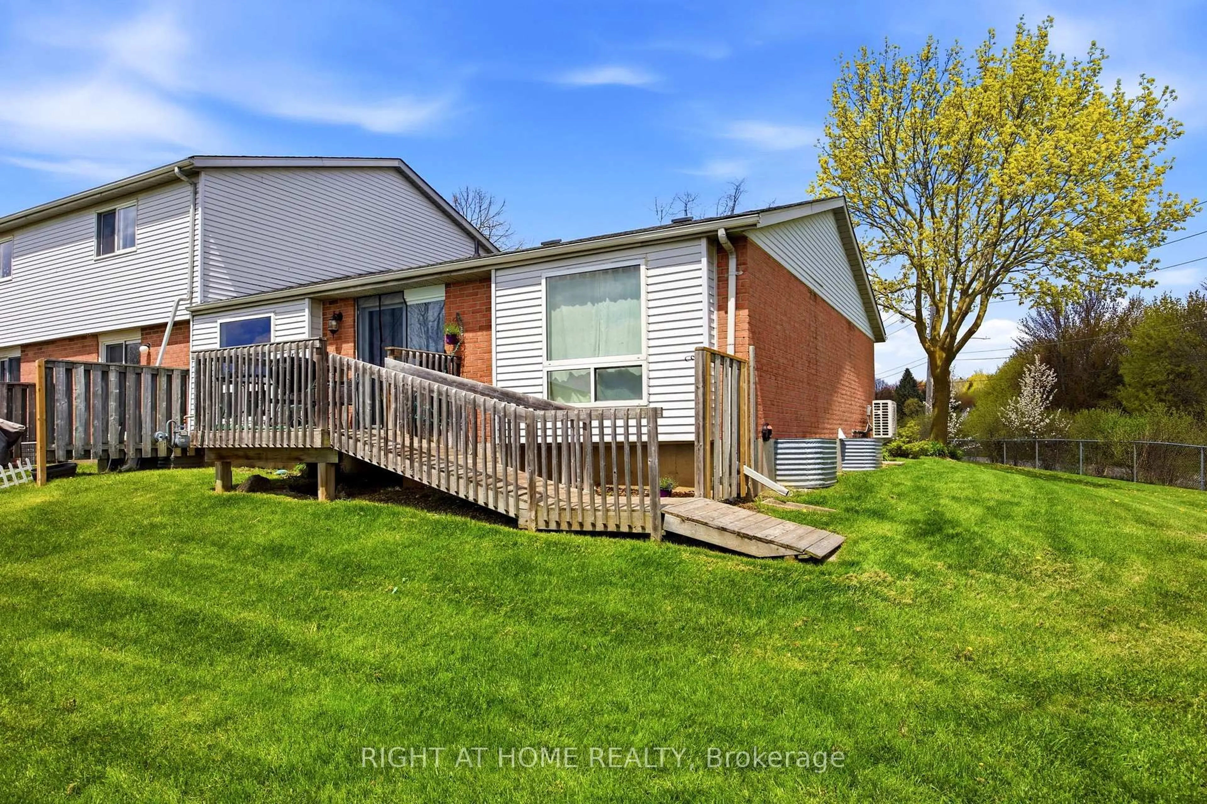 A pic from outside/outdoor area/front of a property/back of a property/a pic from drone, unknown for 40 Imperial Rd #20, Guelph Ontario N1H 8B4