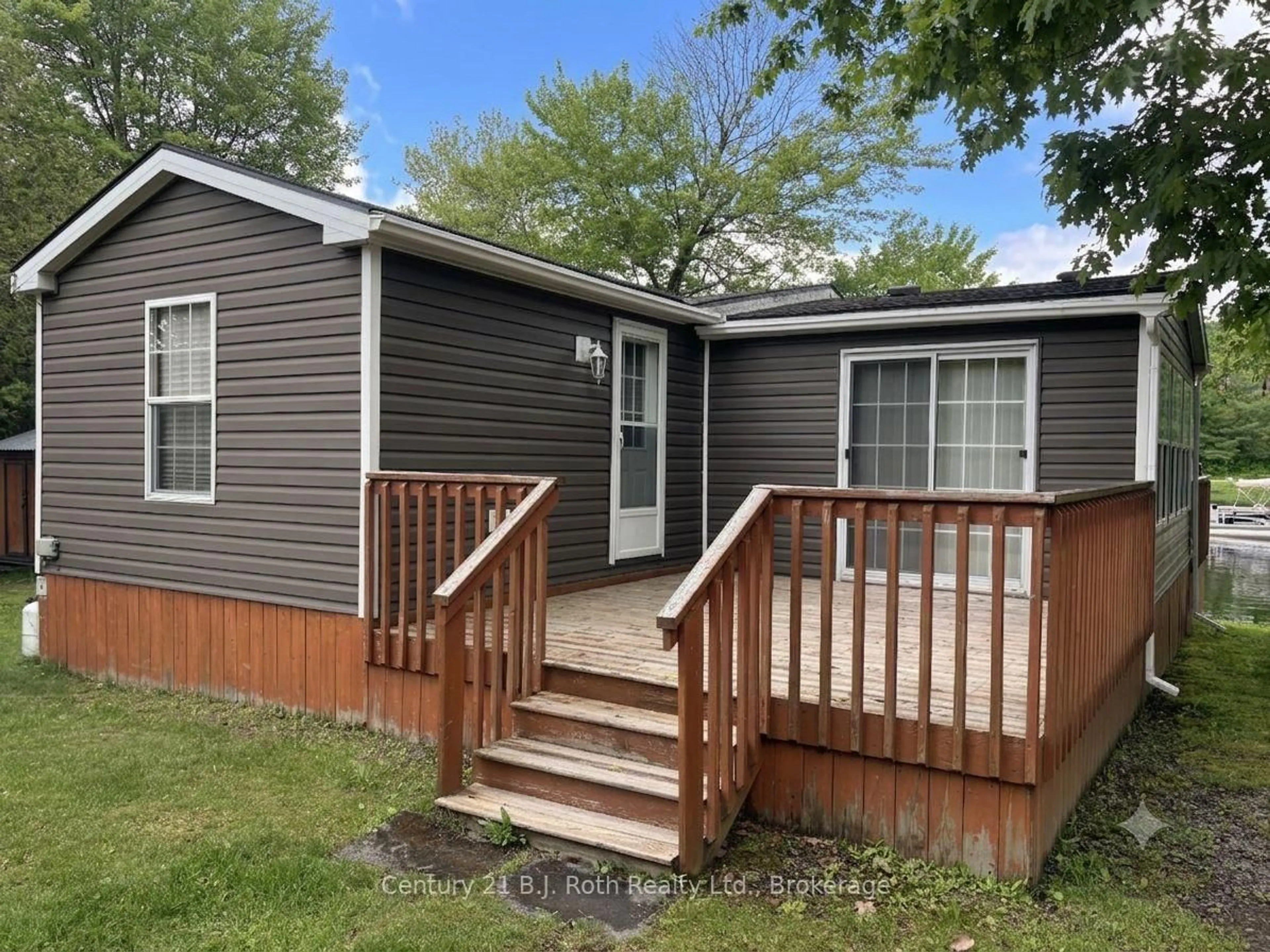 Home with vinyl exterior material, street for 1336 South Morrison Lake Rd #4 Fernbrook, Gravenhurst Ontario P0E 1G0