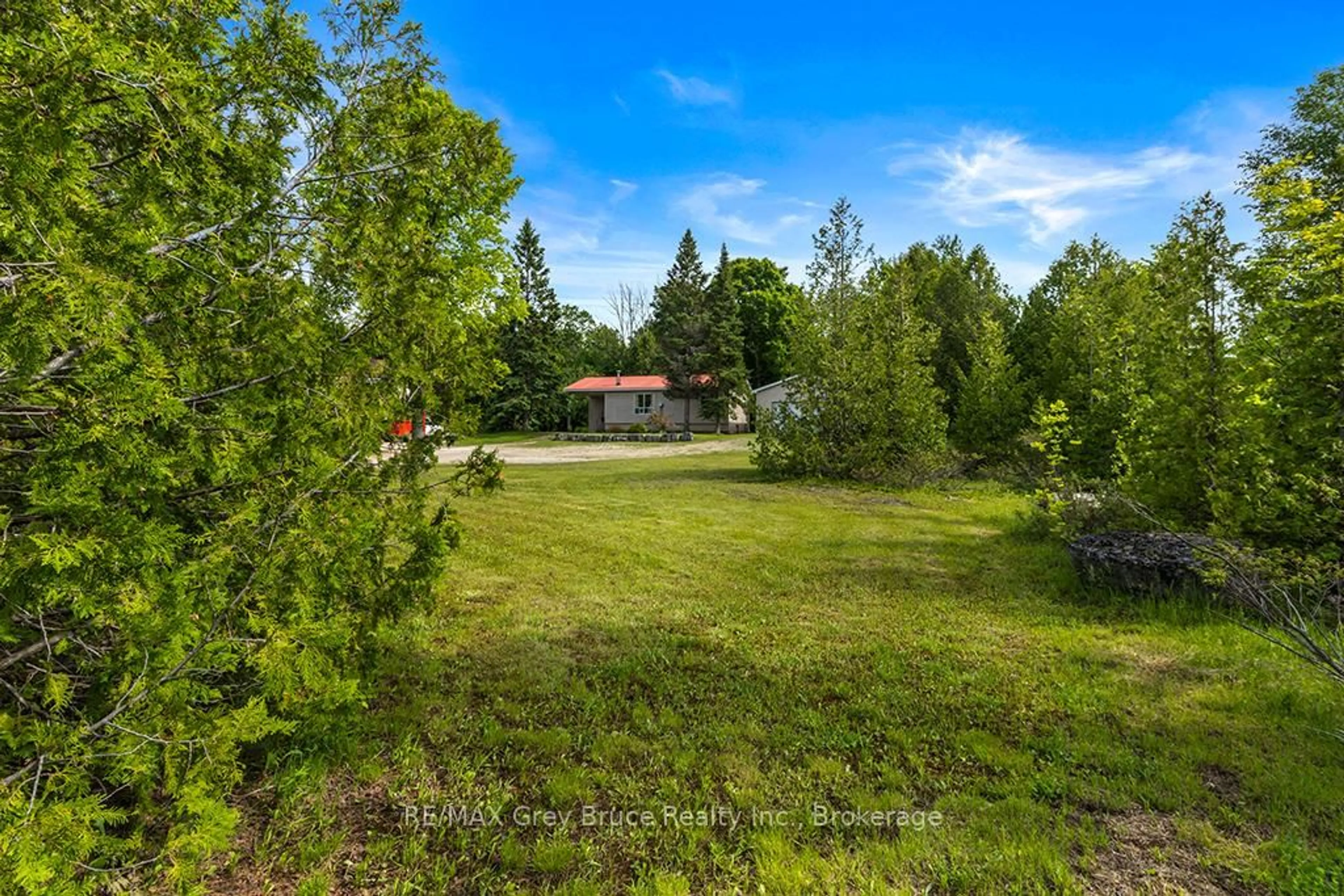 A pic from outside/outdoor area/front of a property/back of a property/a pic from drone, forest/trees view for 335 Pike Bay Rd, Northern Bruce Peninsula Ontario N0H 1X0