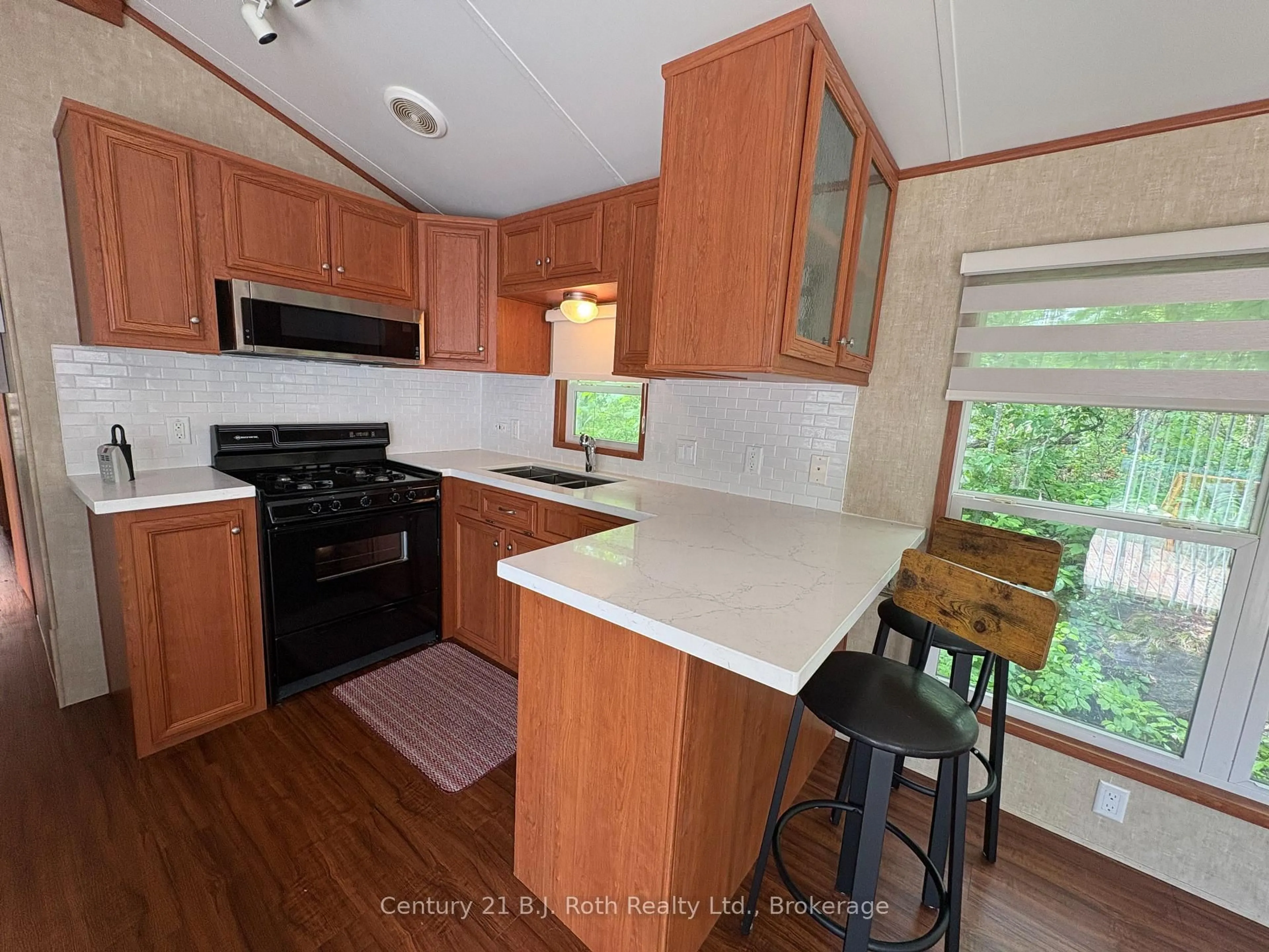 Standard kitchen, wood/laminate floor for 1336 South Morrison Lake Rd #12 Morrison Creek, Gravenhurst Ontario P0E 1G0