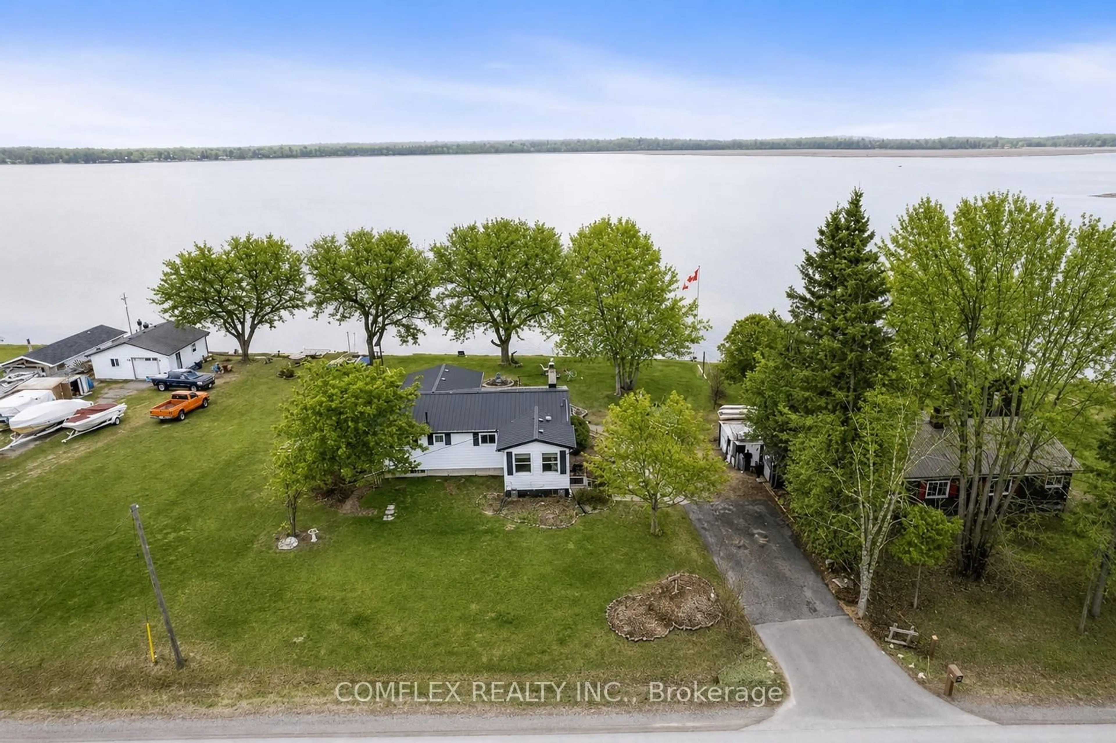 A pic from outside/outdoor area/front of a property/back of a property/a pic from drone, water/lake/river/ocean view for 1982 Pigeon Lake Rd, Kawartha Lakes Ontario K9V 4R5