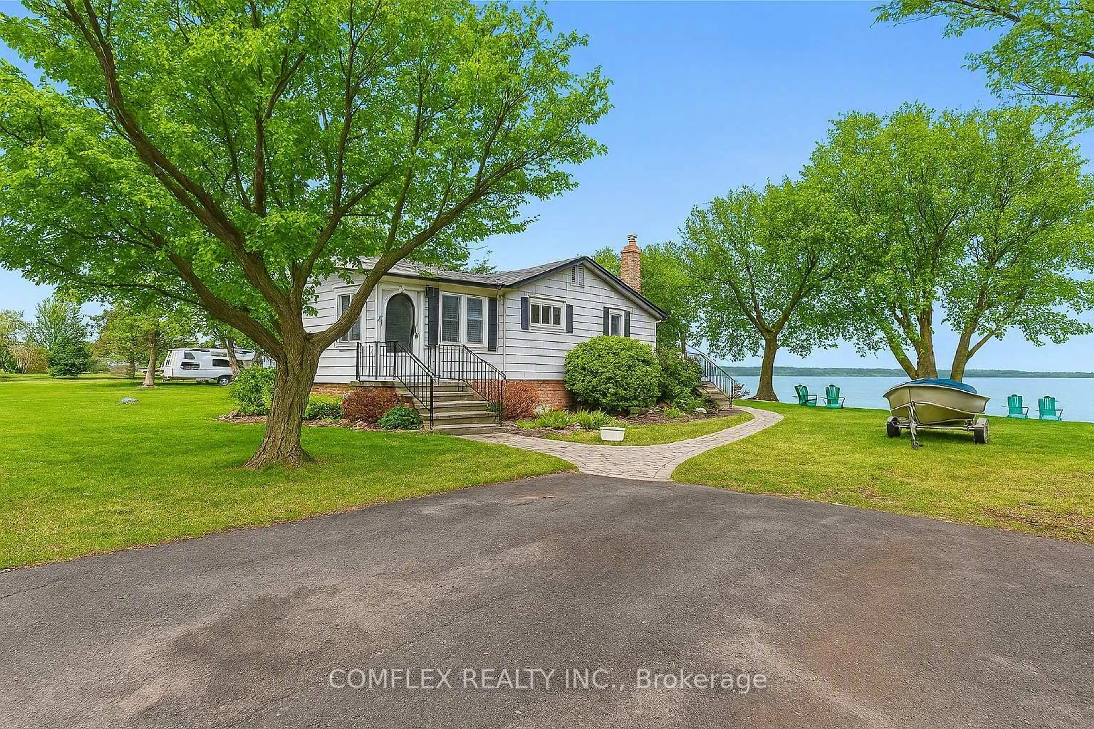 A pic from outside/outdoor area/front of a property/back of a property/a pic from drone, water/lake/river/ocean view for 1982 Pigeon Lake Rd, Kawartha Lakes Ontario K9V 4R5