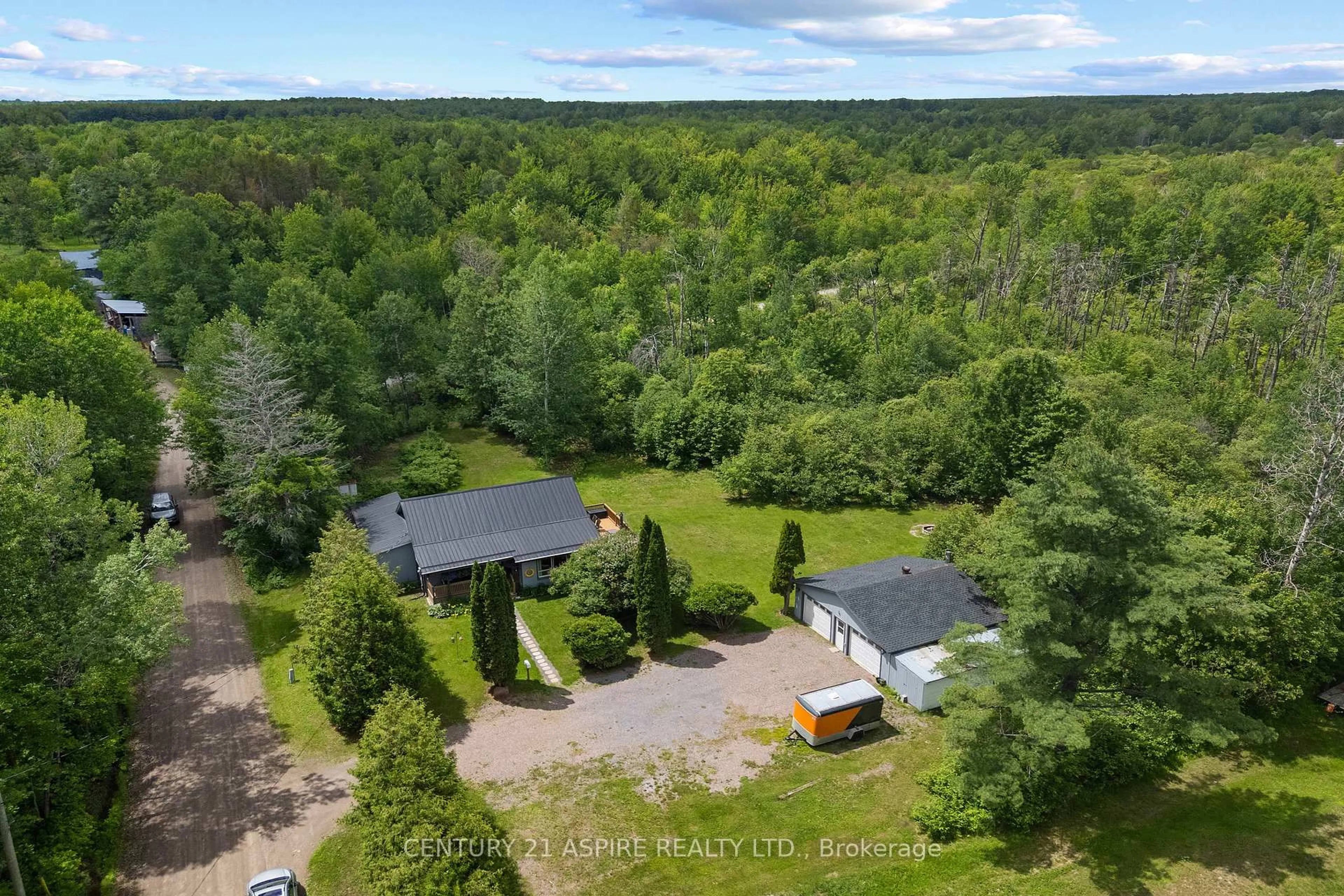 A pic from outside/outdoor area/front of a property/back of a property/a pic from drone, forest/trees view for 34 Shady Lane, Petawawa Ontario K8A 7Z5