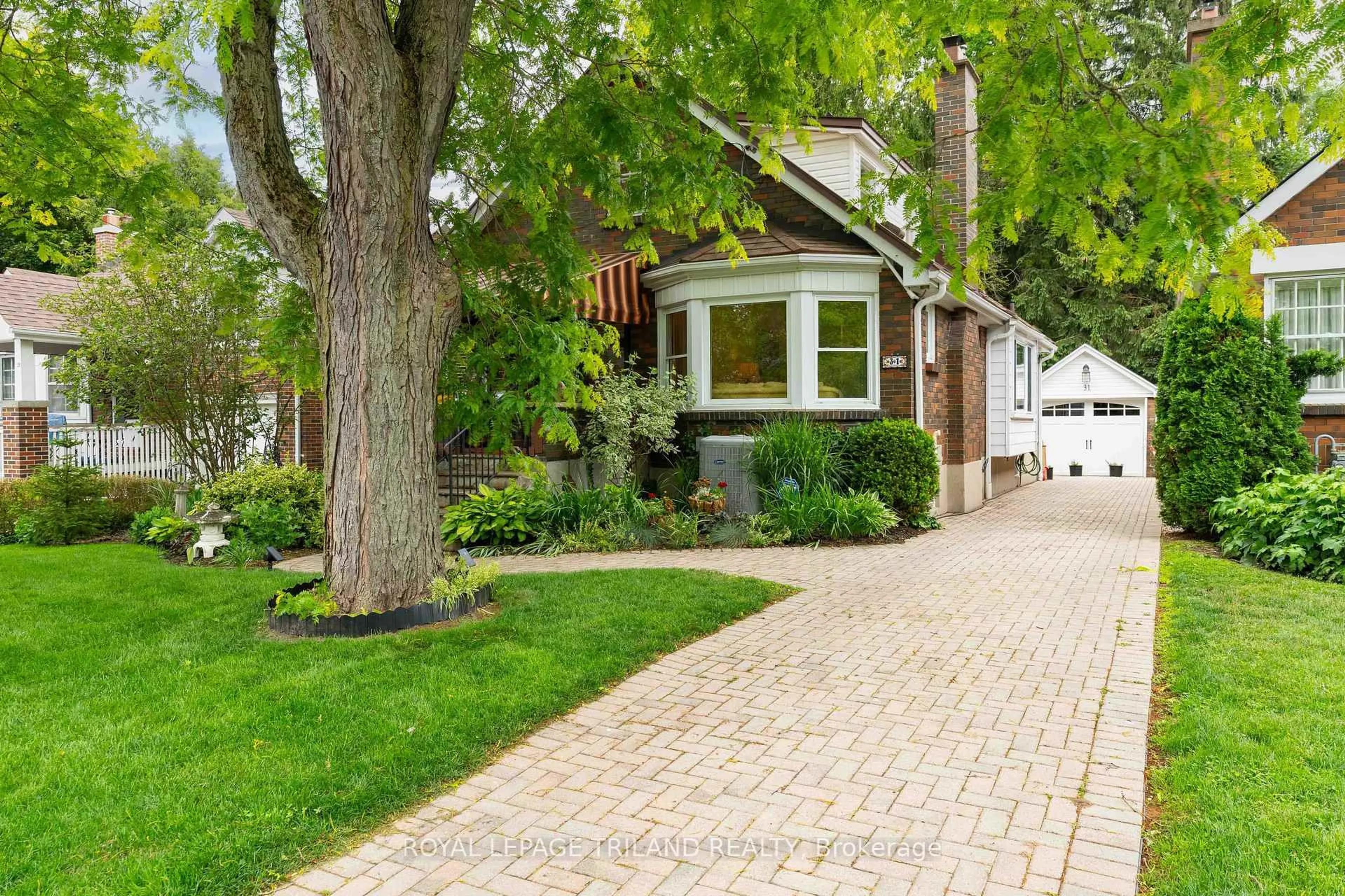 Home with brick exterior material, street for 31 Chalmers St, London East Ontario N5Y 4E8