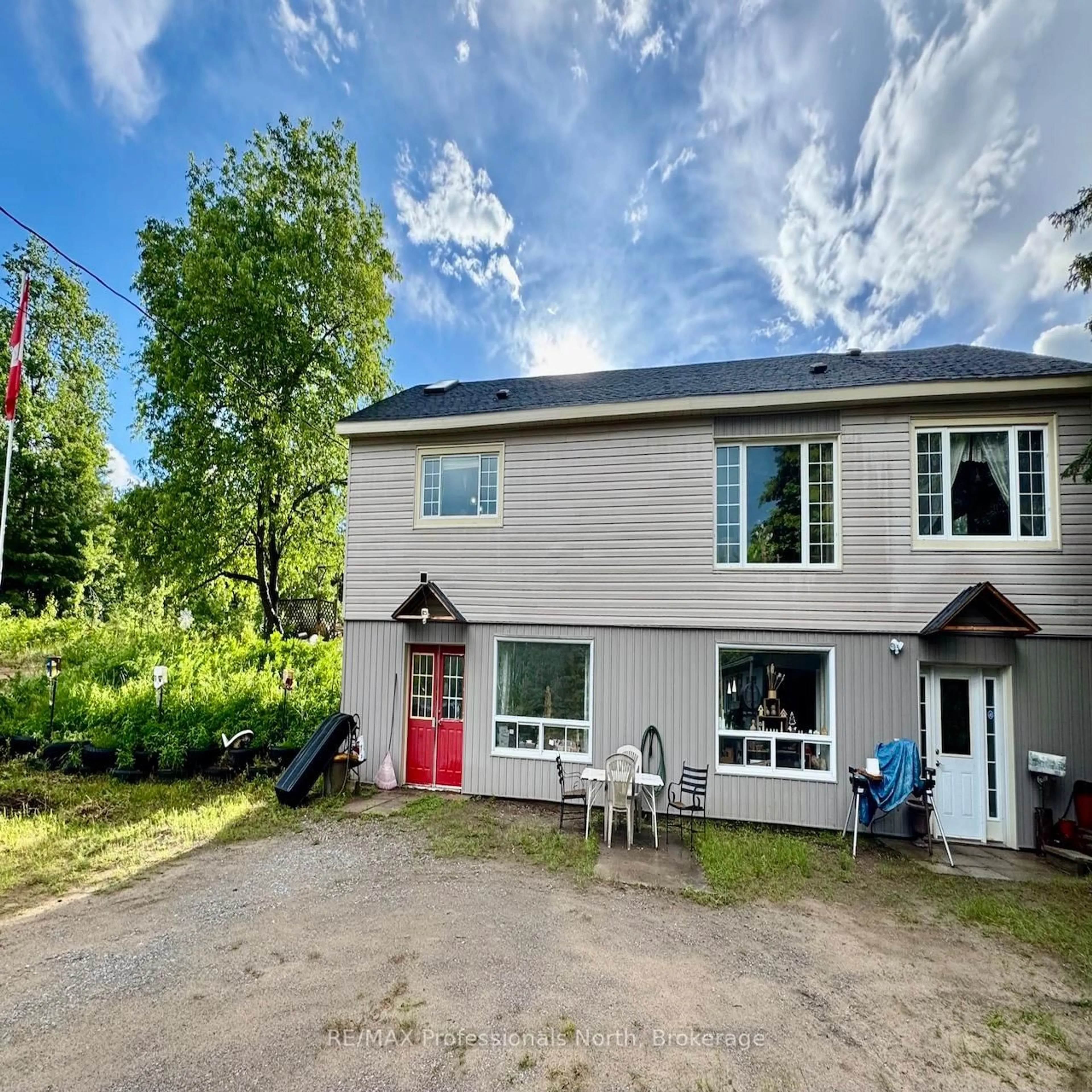 A pic from outside/outdoor area/front of a property/back of a property/a pic from drone, building for 7057 County Road 503, Minden Hills Ontario K0M 2A1