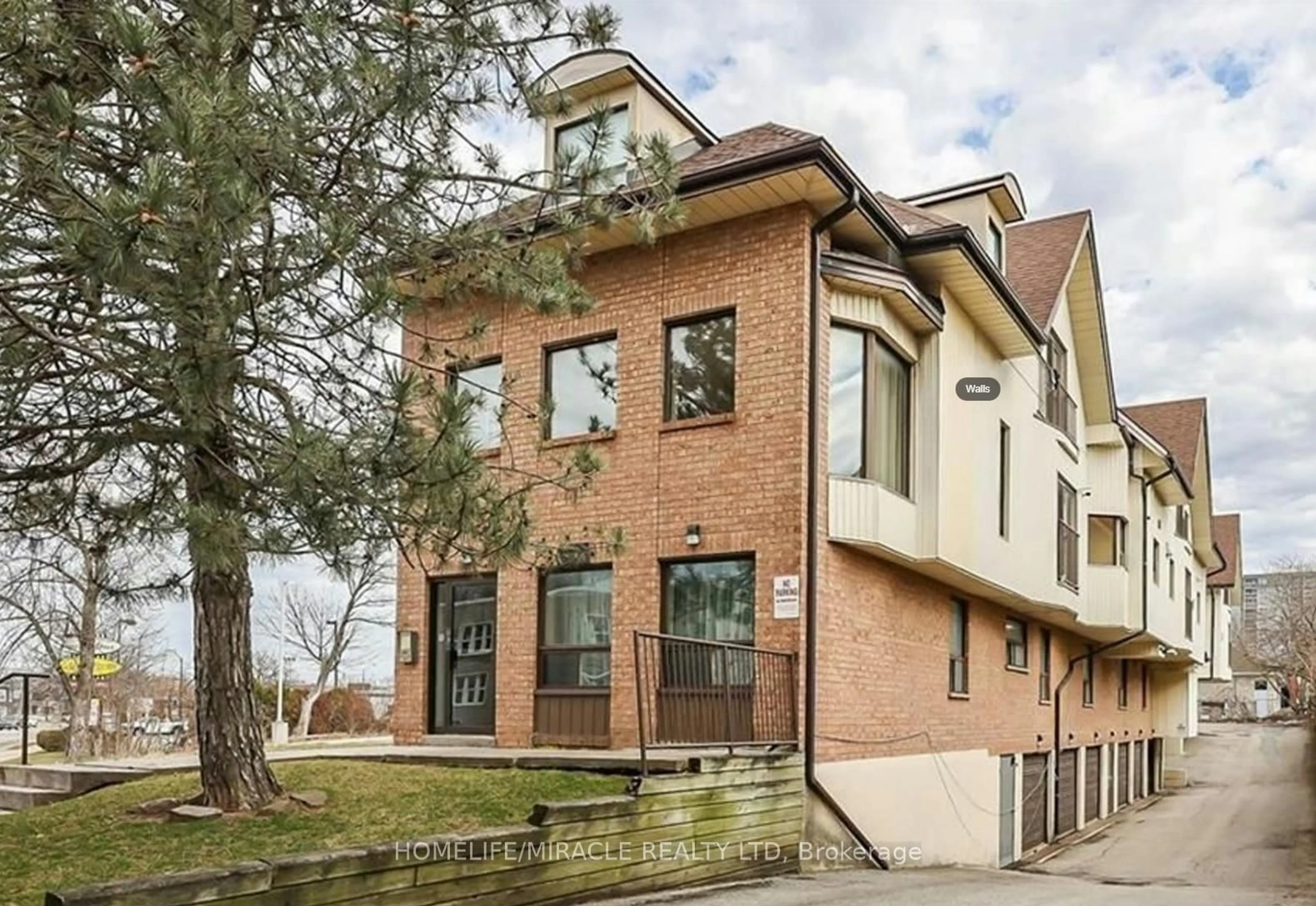 Home with brick exterior material, street for 4872 Valley Way #201, Niagara Falls Ontario L2E 1W3
