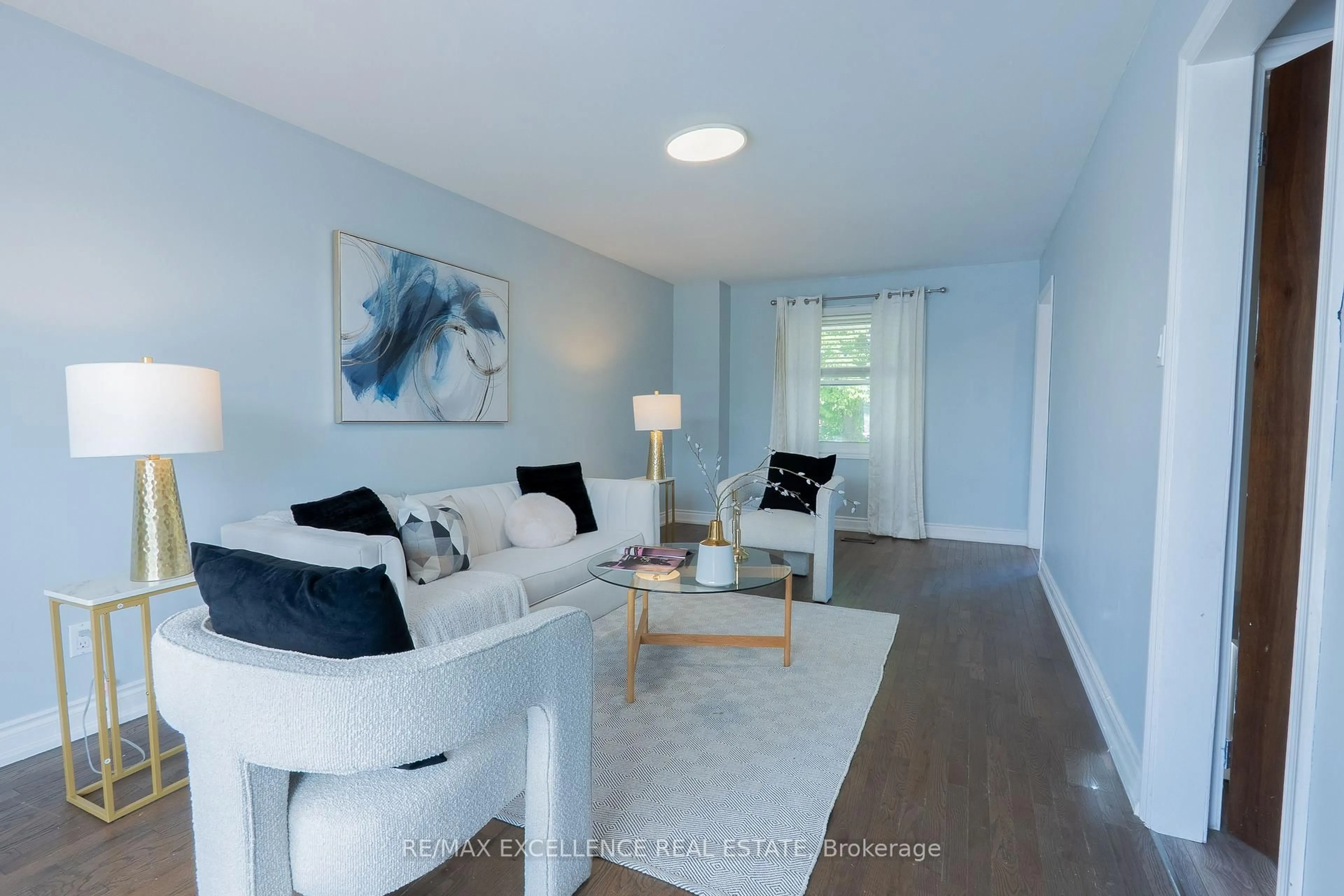 Living room with furniture, wood/laminate floor for 27 WADSWORTH Dr, Ingersoll Ontario N5C 3L3