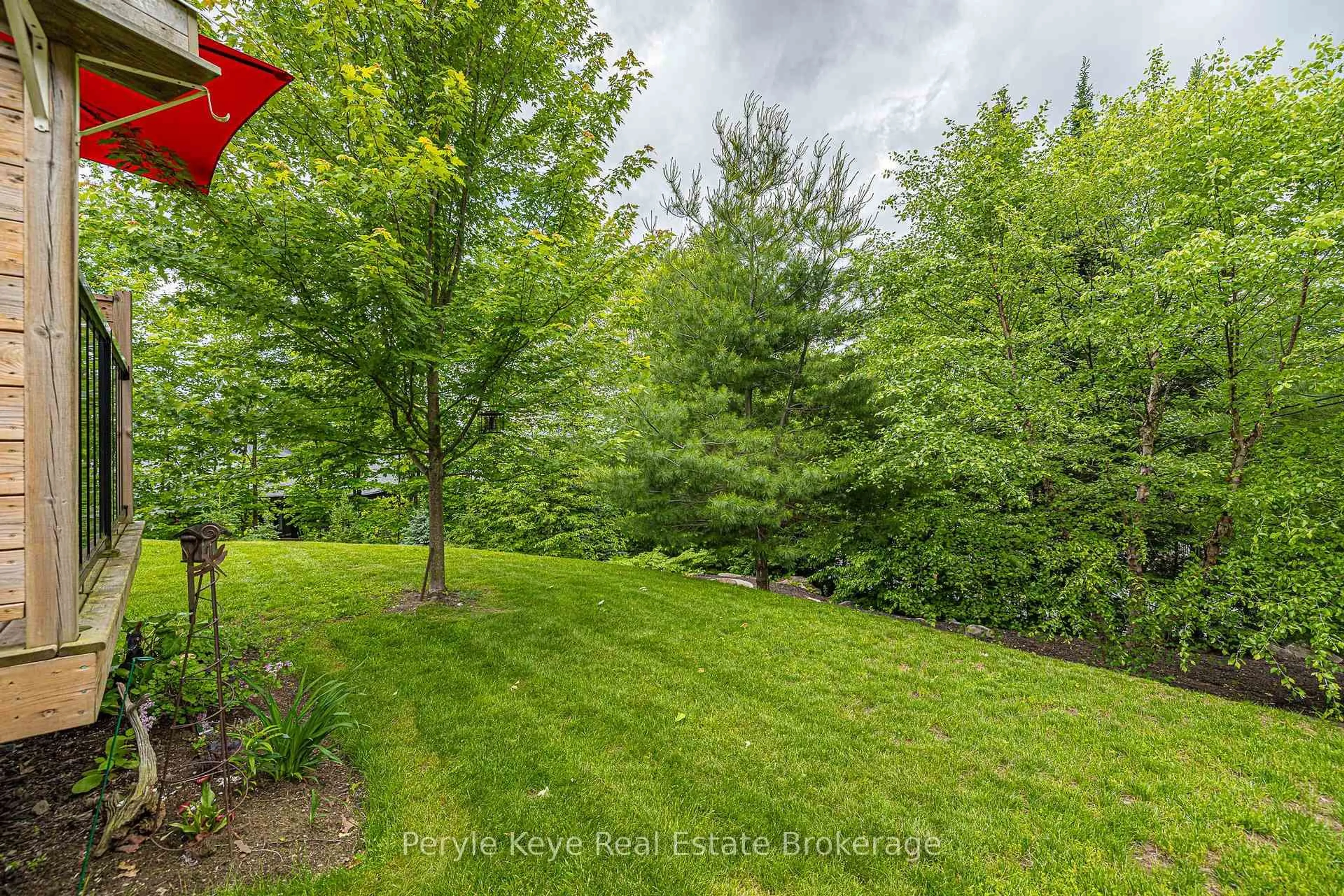 A pic from outside/outdoor area/front of a property/back of a property/a pic from drone, forest/trees view for 6 Serenity Place Cres, Huntsville Ontario P1H 0C4