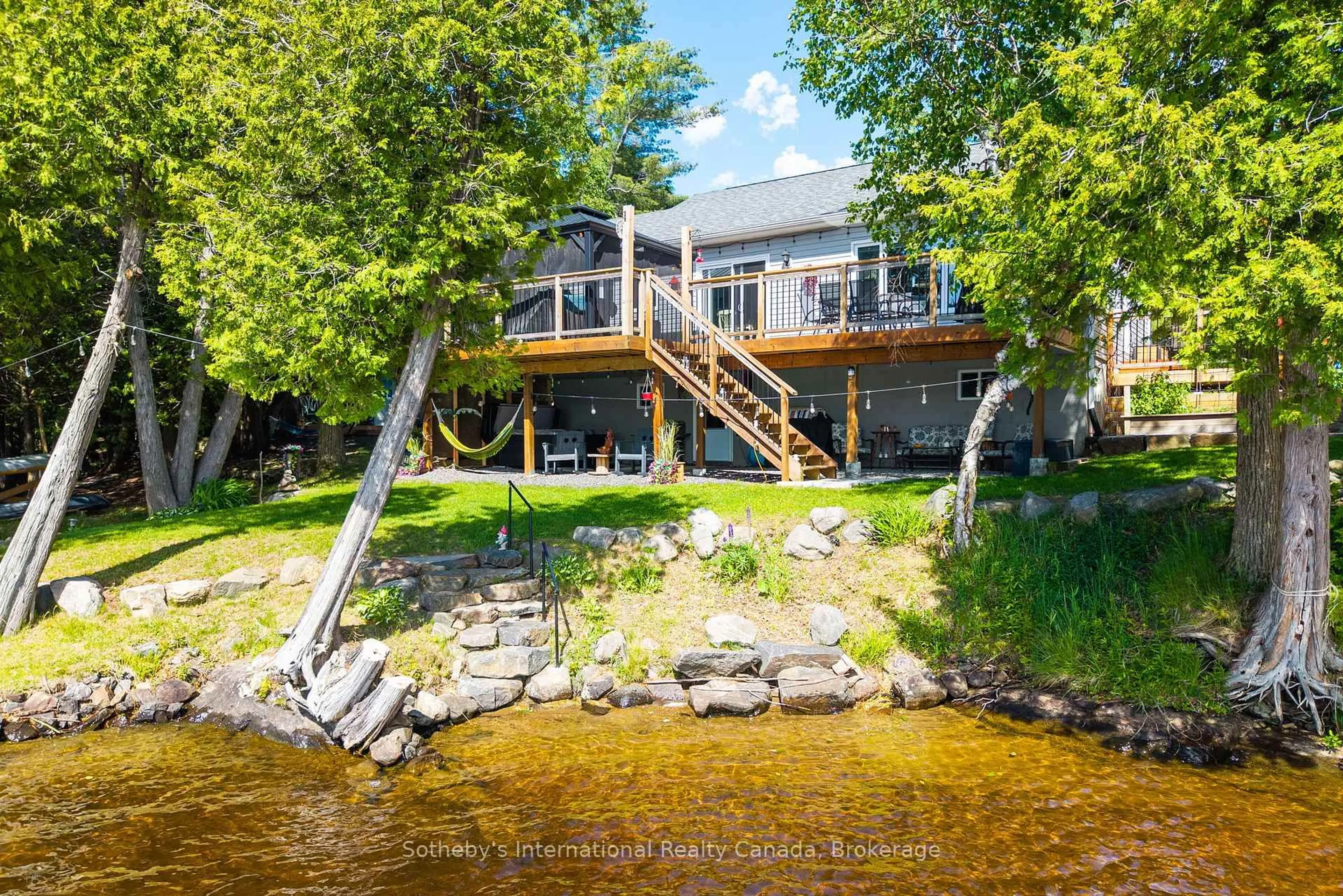 A pic from outside/outdoor area/front of a property/back of a property/a pic from drone, water/lake/river/ocean view for 8 Lakeview Cres, McKellar Ontario P2A 0B5