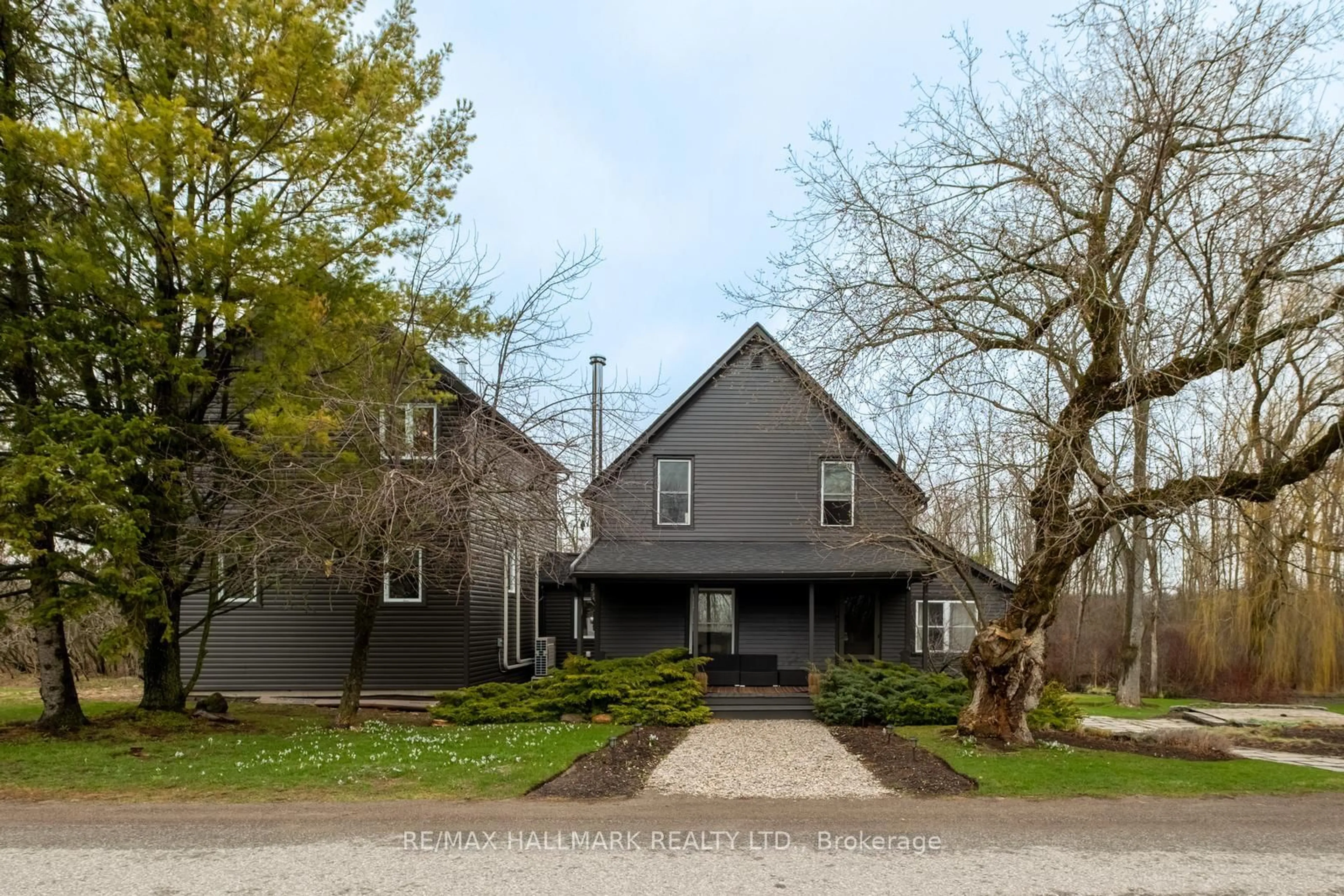 A pic from outside/outdoor area/front of a property/back of a property/a pic from drone, street for 709 Old Milford Rd, Prince Edward County Ontario K0K 2T0