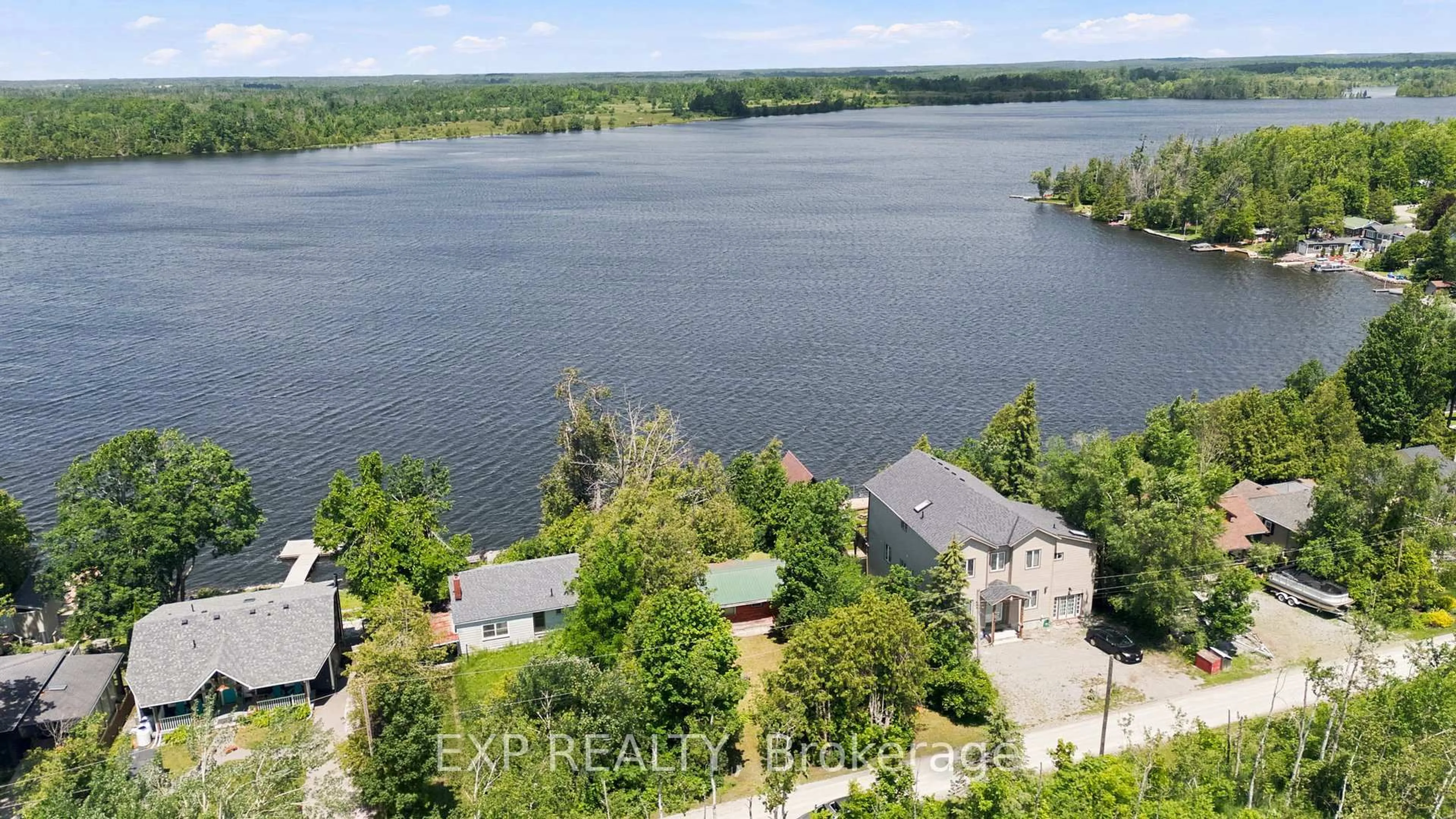 A pic from outside/outdoor area/front of a property/back of a property/a pic from drone, water/lake/river/ocean view for 61 North Taylor Rd, Kawartha Lakes Ontario K0M 2B0