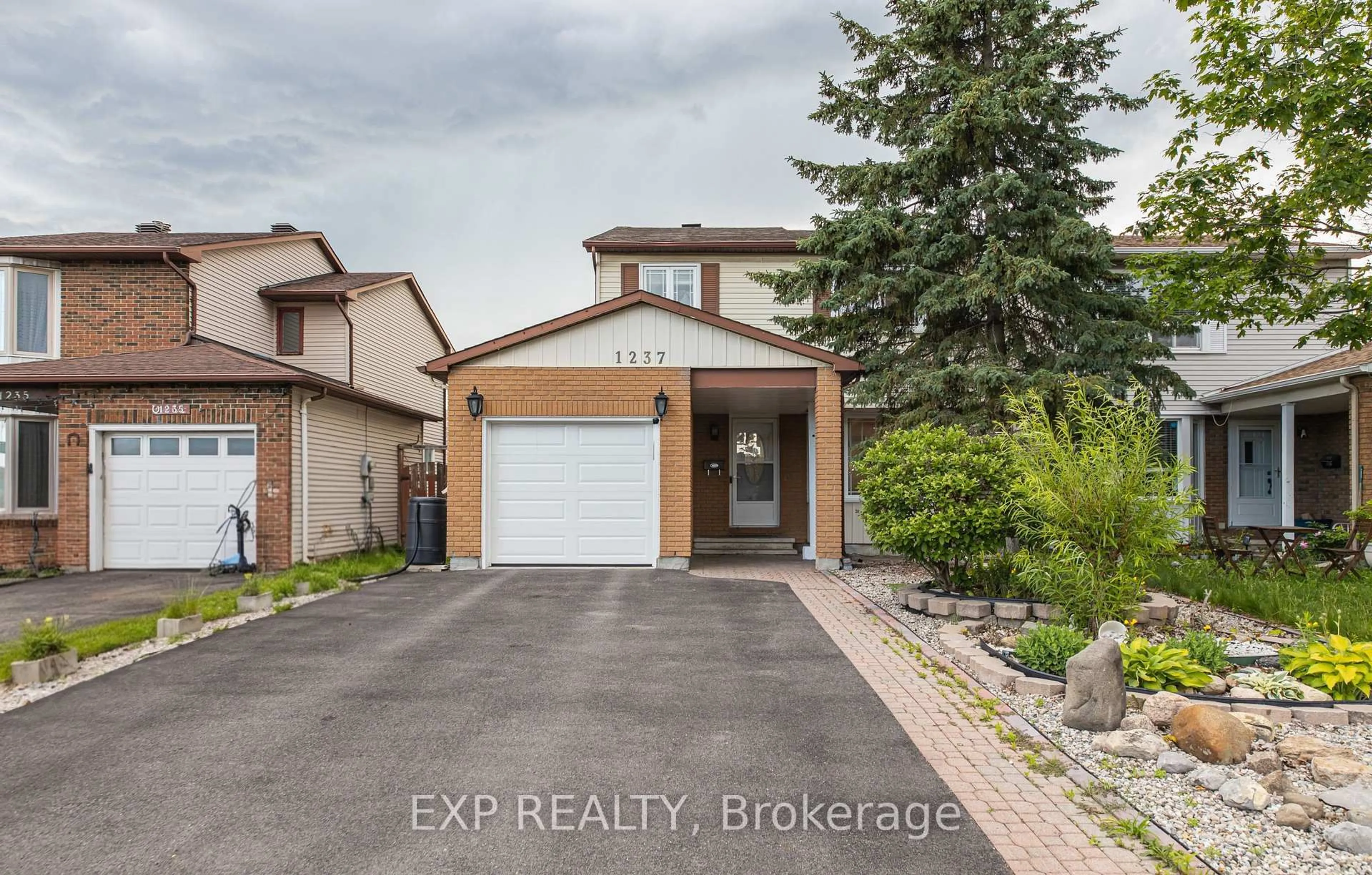 Home with brick exterior material, street for 1237 Cedarcroft Cres, Ottawa Ontario K1B 5G9