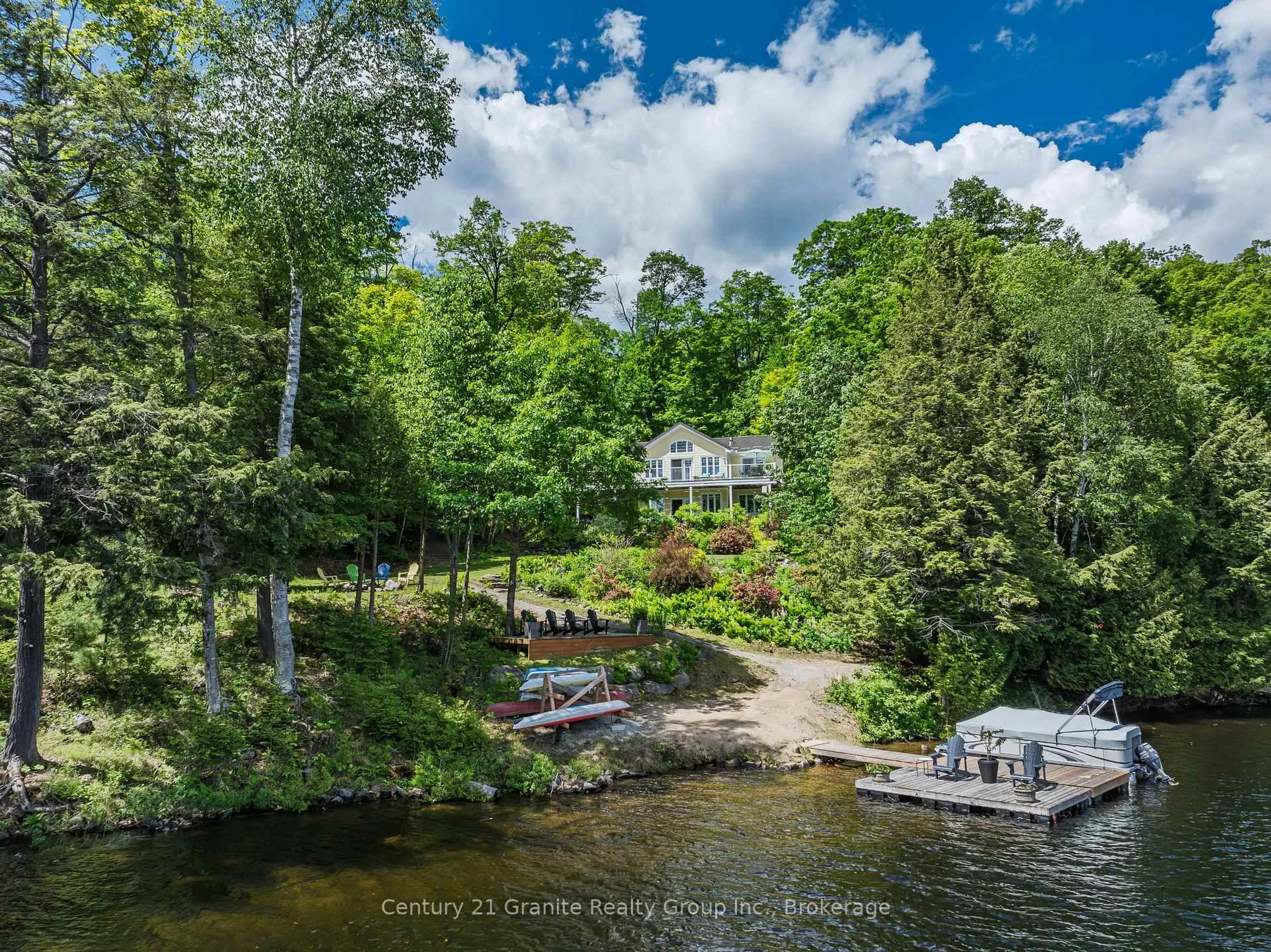 A pic from outside/outdoor area/front of a property/back of a property/a pic from drone, water/lake/river/ocean view for 1070 Shipley Dr, Minden Hills Ontario K0M 1S0