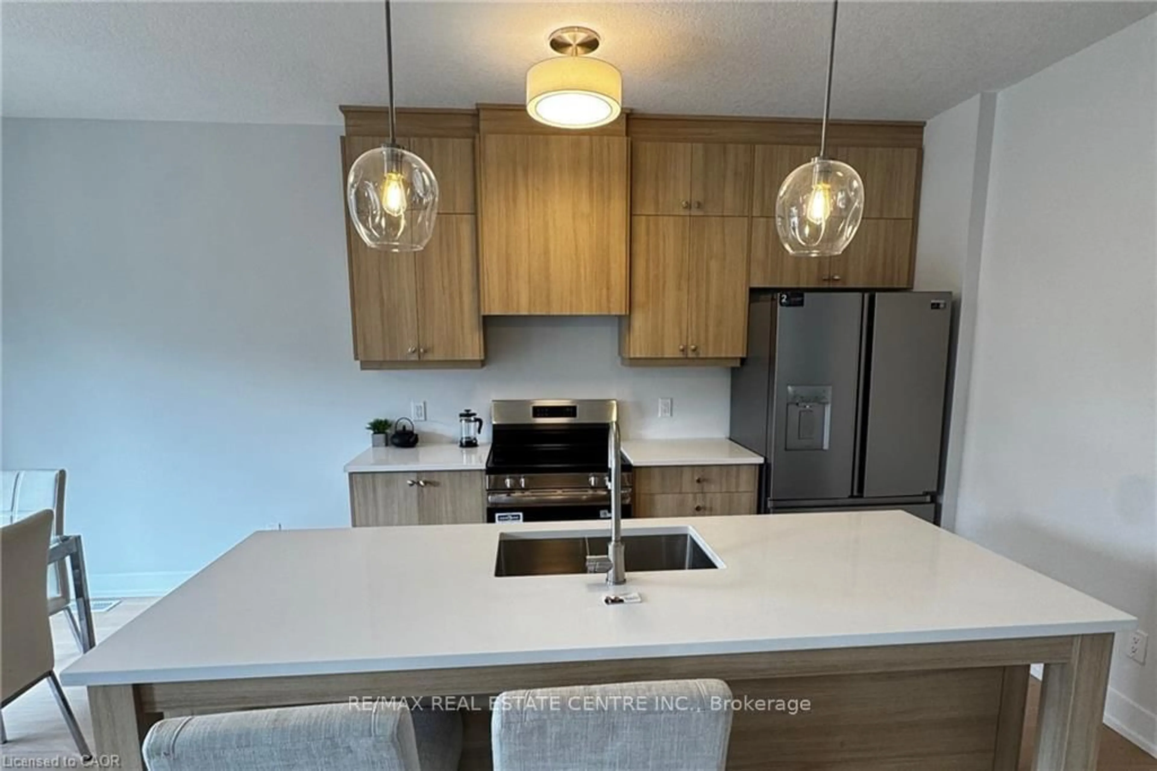 Open concept kitchen, wood/laminate floor for 123 Maple St, Mapleton Ontario N0G 1P0