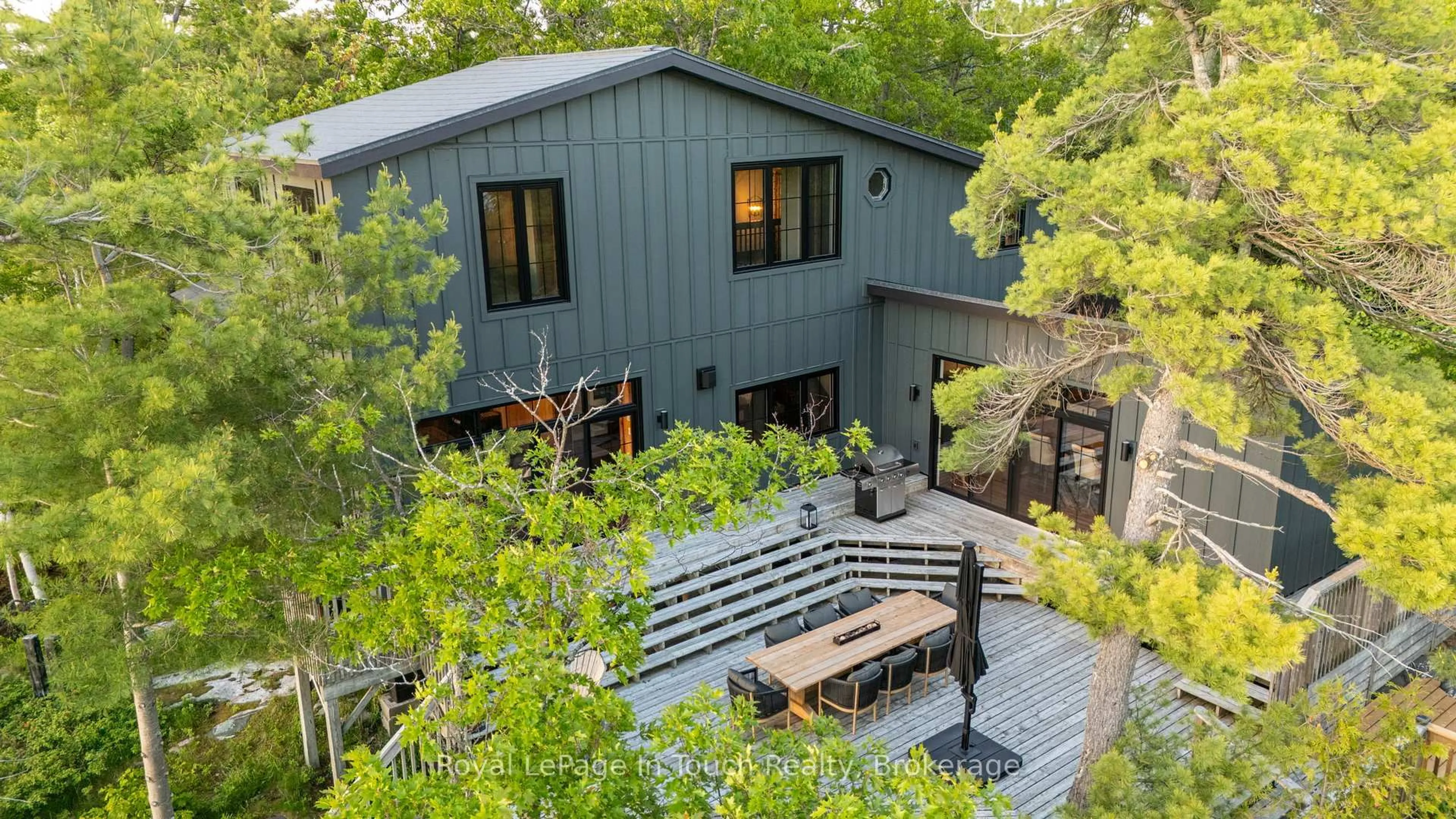 A pic from outside/outdoor area/front of a property/back of a property/a pic from drone, forest/trees view for 1 Gb466 - Tower Island, The Archipelago Ontario P2A 0B7