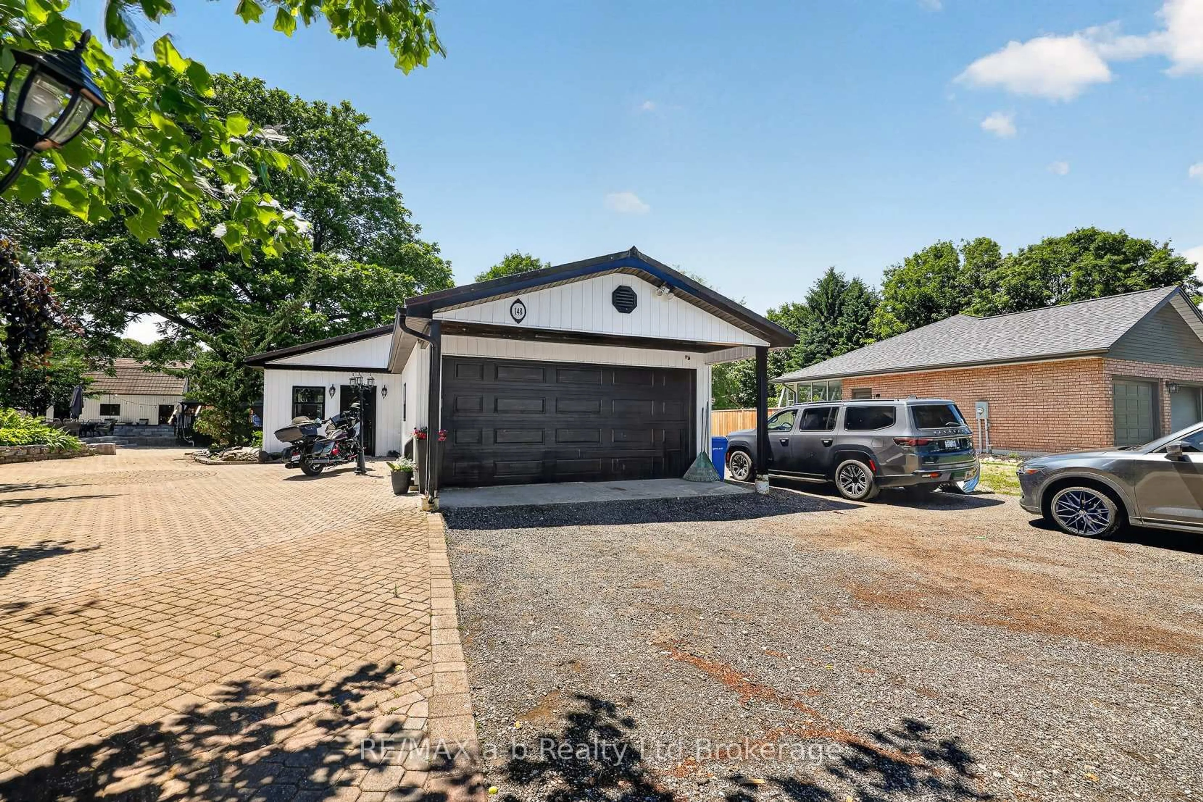 A pic from outside/outdoor area/front of a property/back of a property/a pic from drone, street for 148 Dover St, Norwich Ontario N0J 1R0