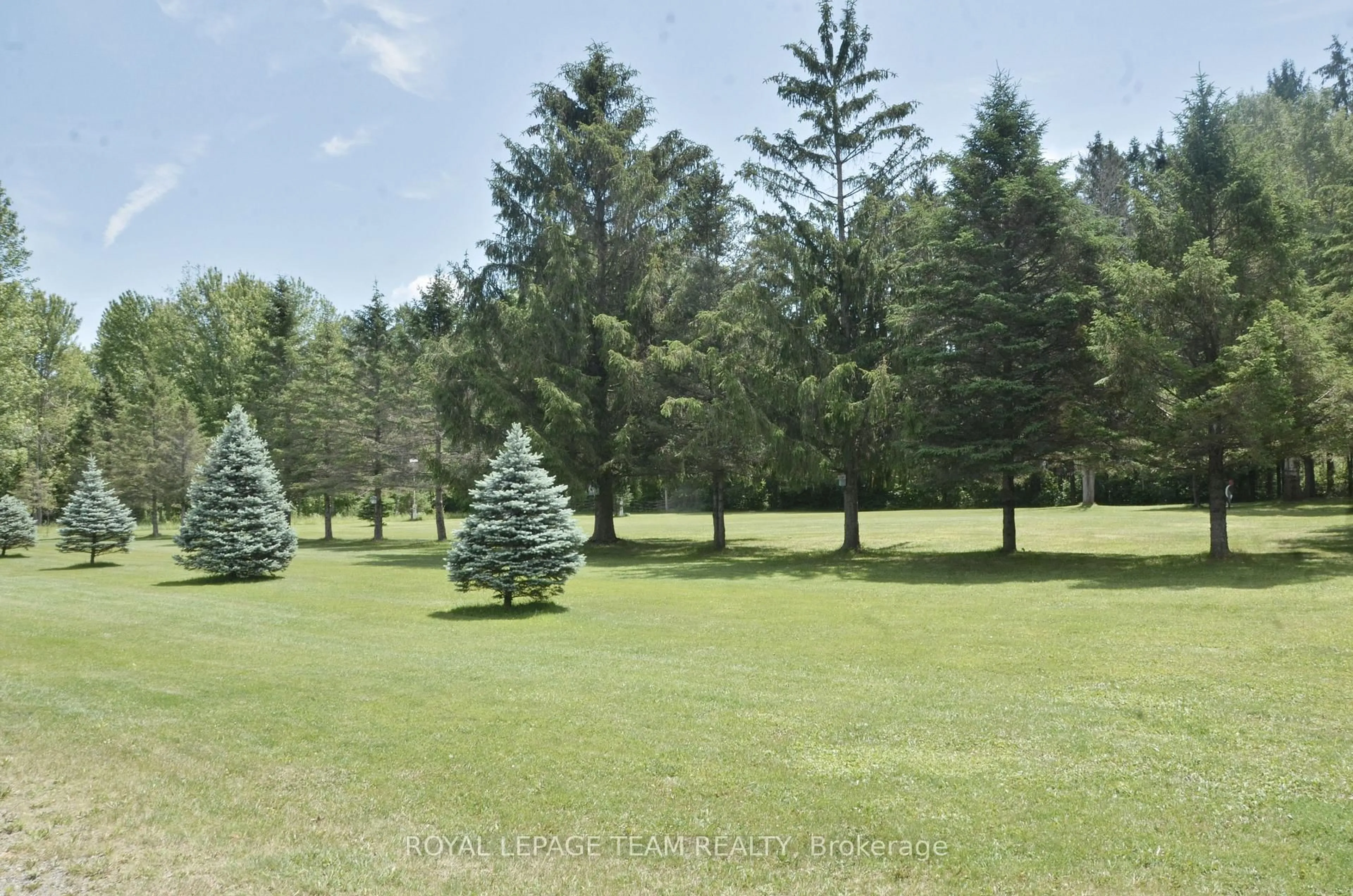 A pic from outside/outdoor area/front of a property/back of a property/a pic from drone, forest/trees view for 4439 Carman Rd, South Dundas Ontario K0E 1C0