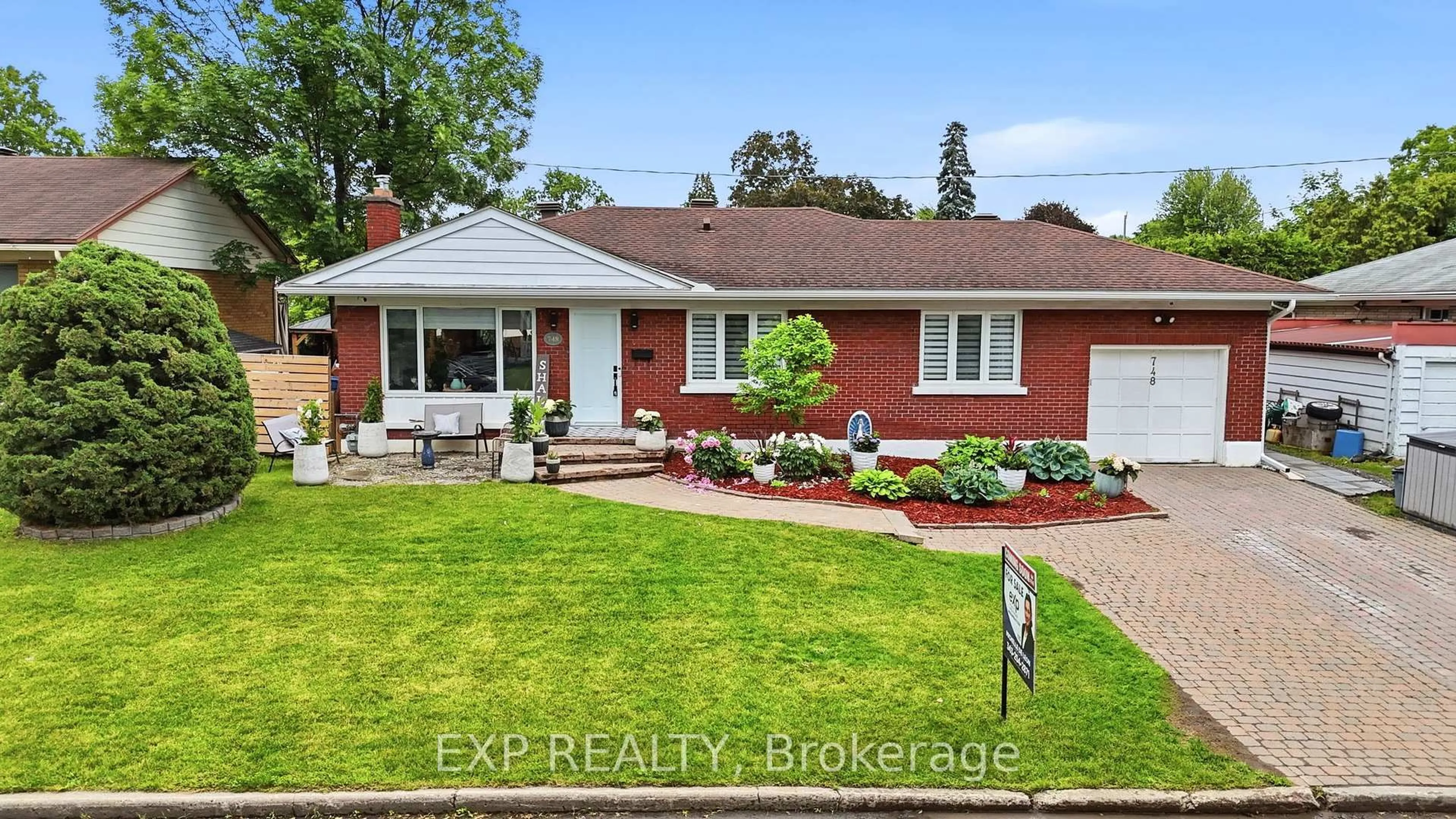 Home with brick exterior material, street for 748 WESTON Dr, Ottawa Ontario K1G 1W2
