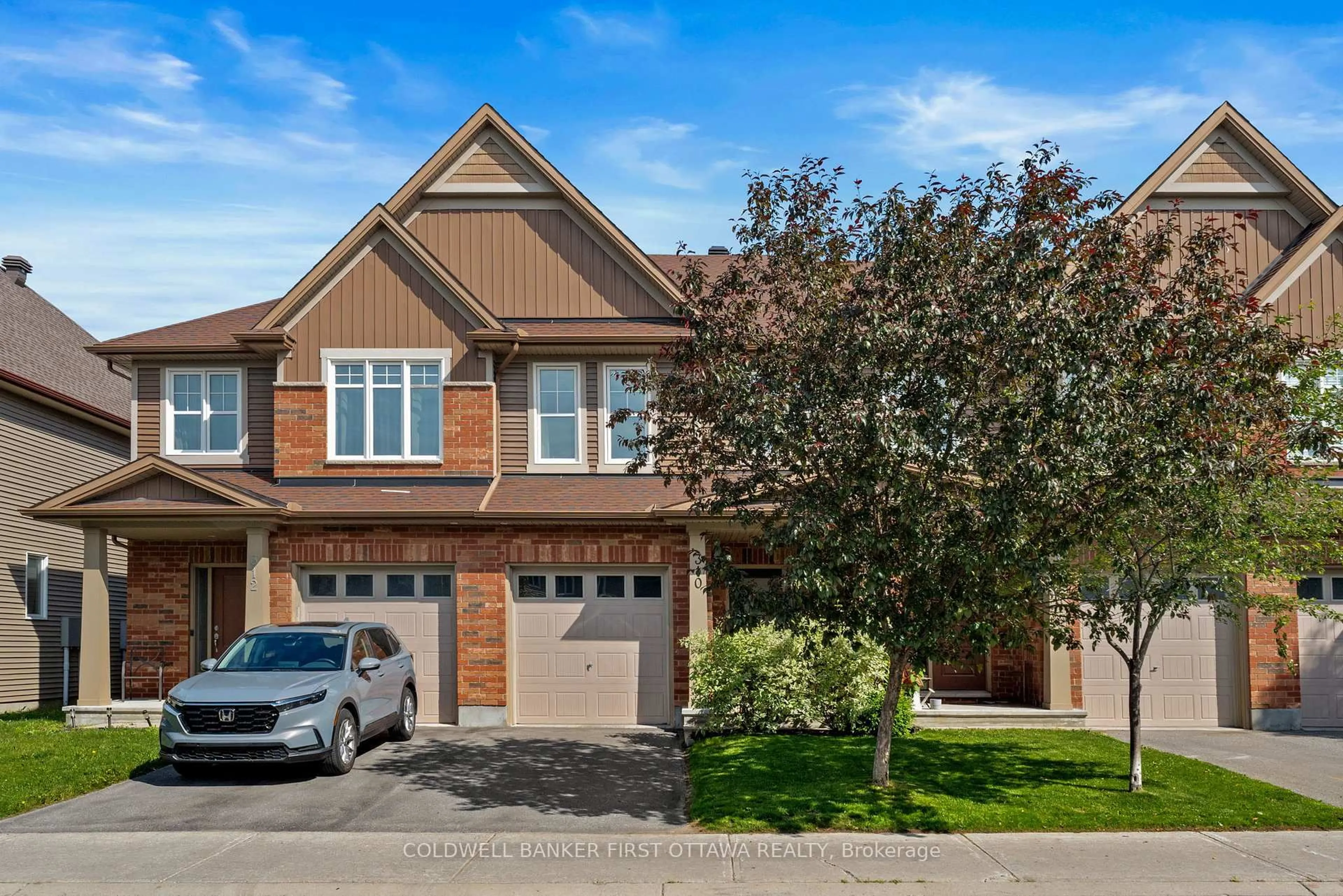 Home with brick exterior material, street for 310 Fergus Cres, Ottawa Ontario K2J 5S4
