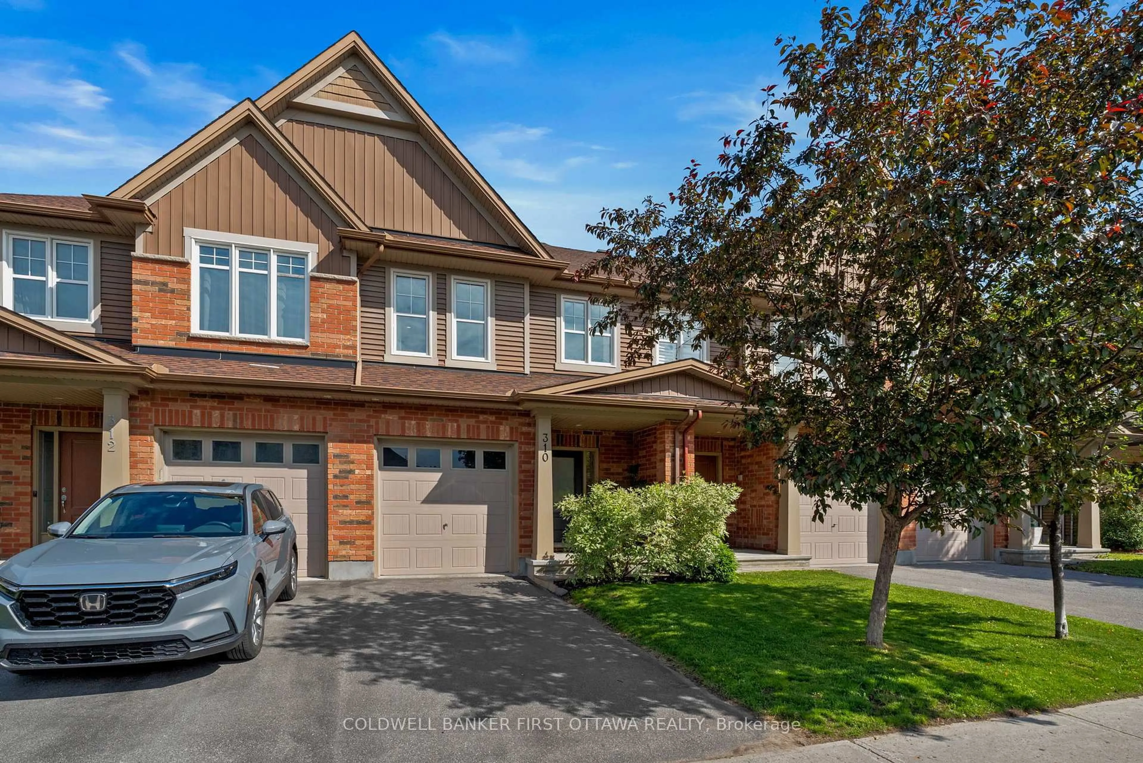 Home with brick exterior material, street for 310 Fergus Cres, Ottawa Ontario K2J 5S4