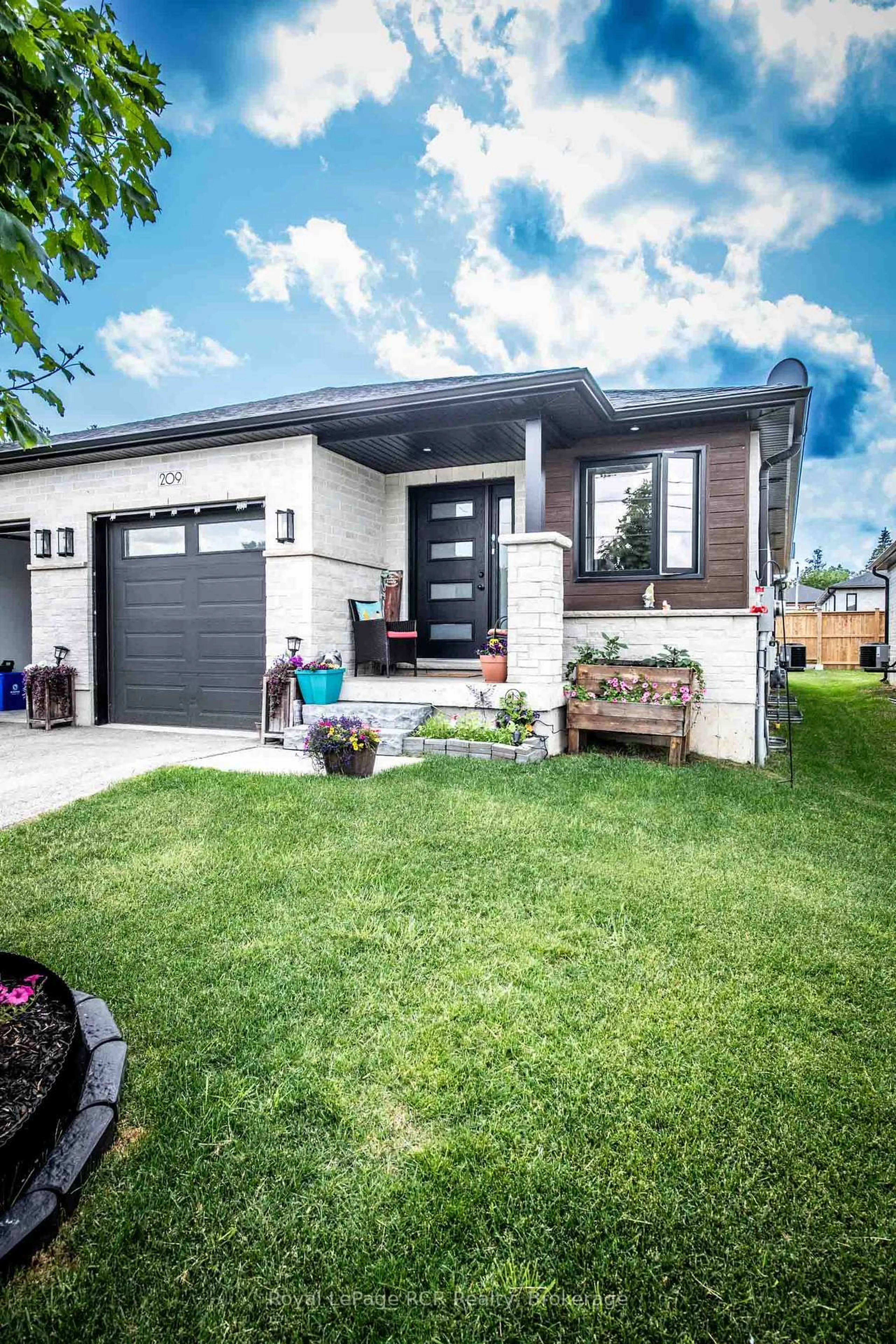 Home with brick exterior material, street for 209 Church St, Wellington North Ontario N0G 2L4