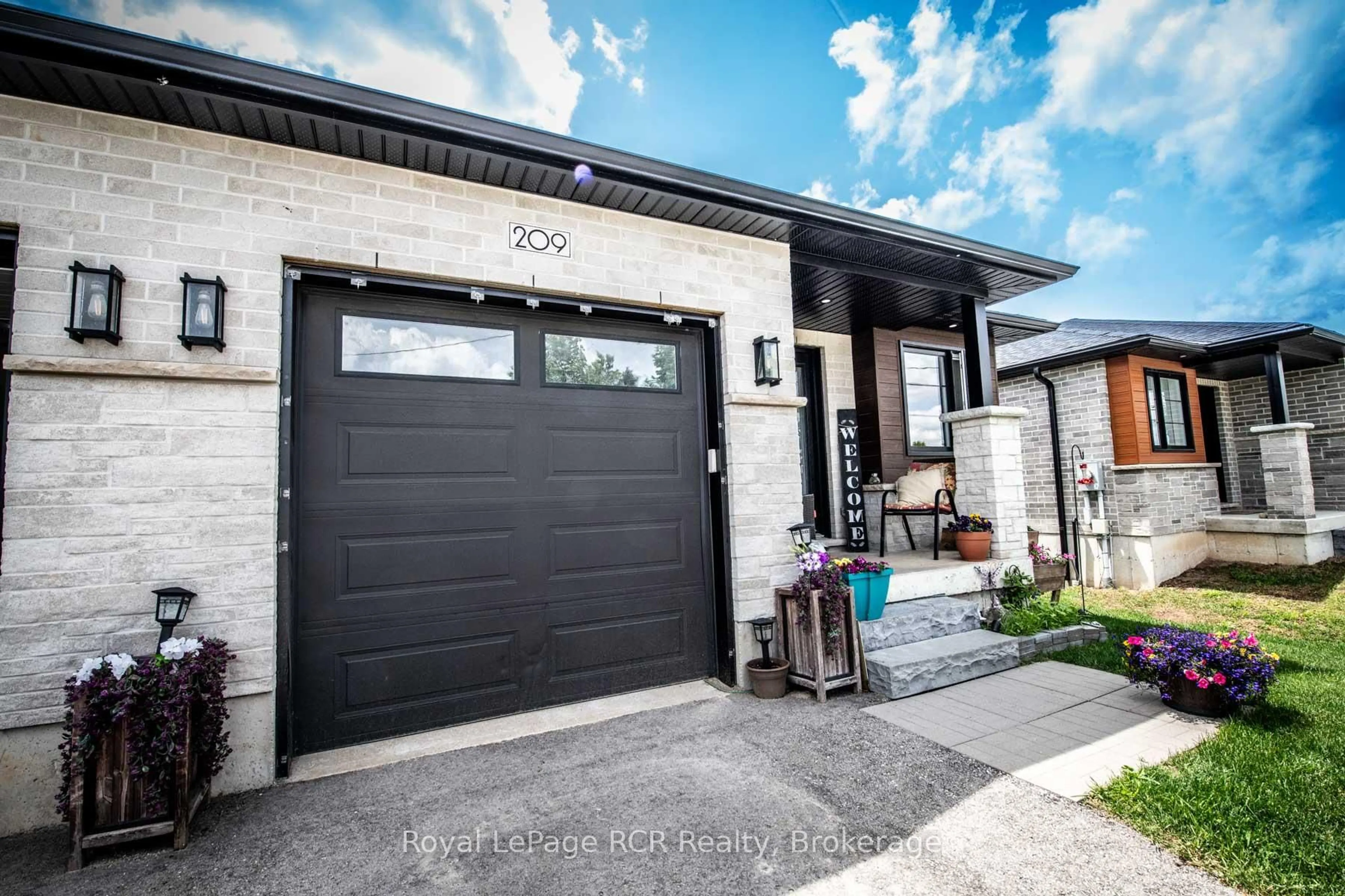 Home with brick exterior material, street for 209 Church St, Wellington North Ontario N0G 2L4