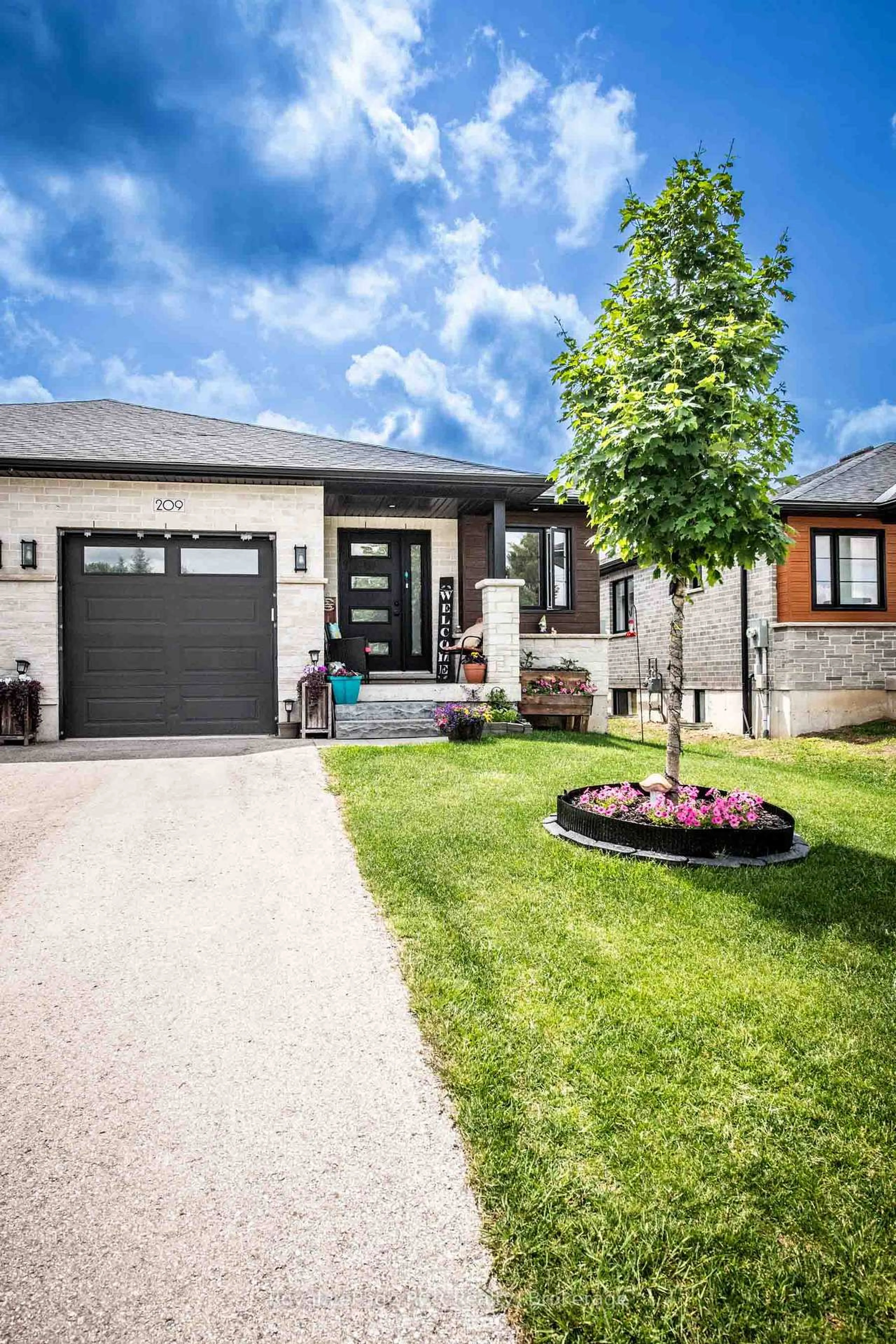 Home with brick exterior material, street for 209 Church St, Wellington North Ontario N0G 2L4