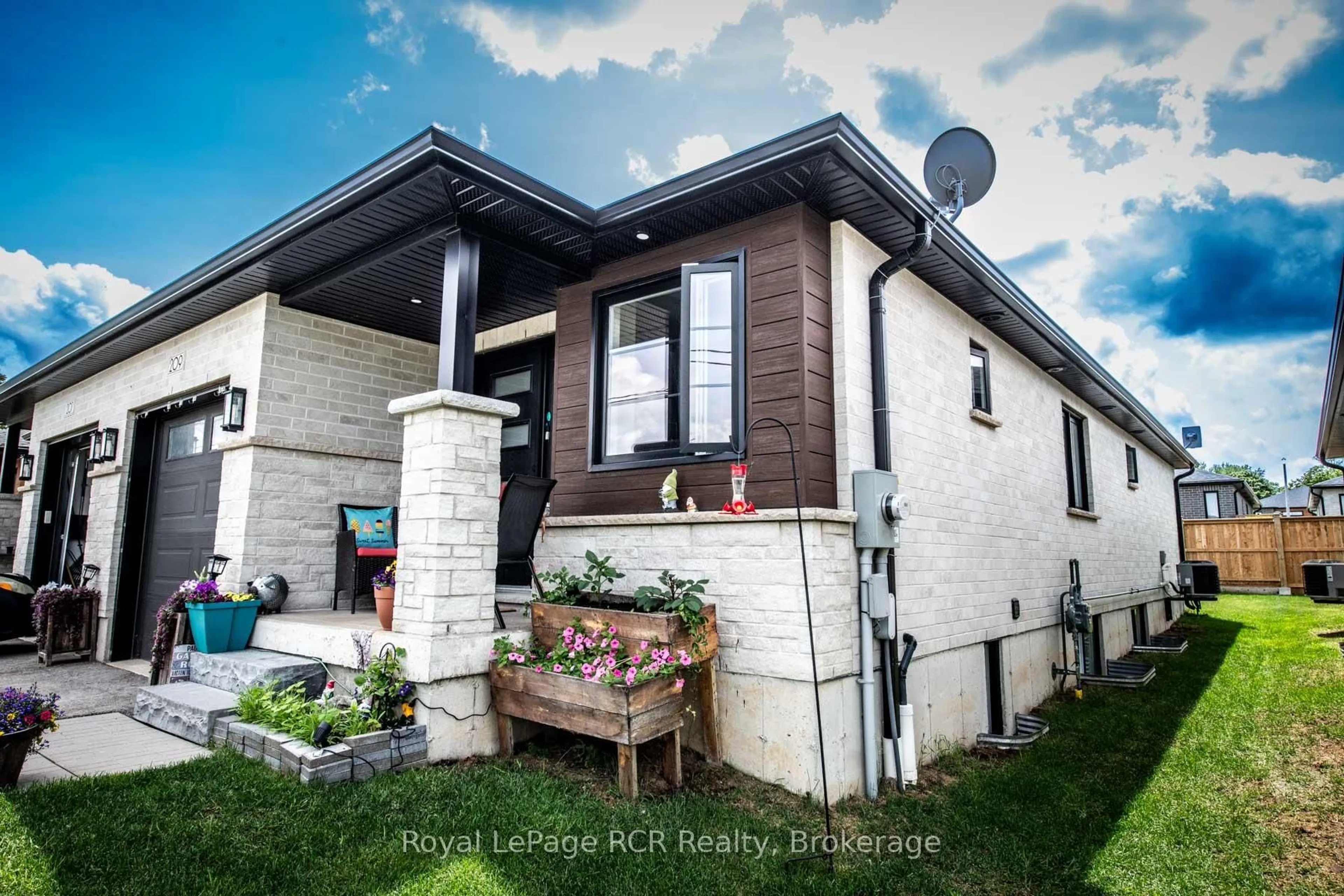 Home with brick exterior material, street for 209 Church St, Wellington North Ontario N0G 2L4