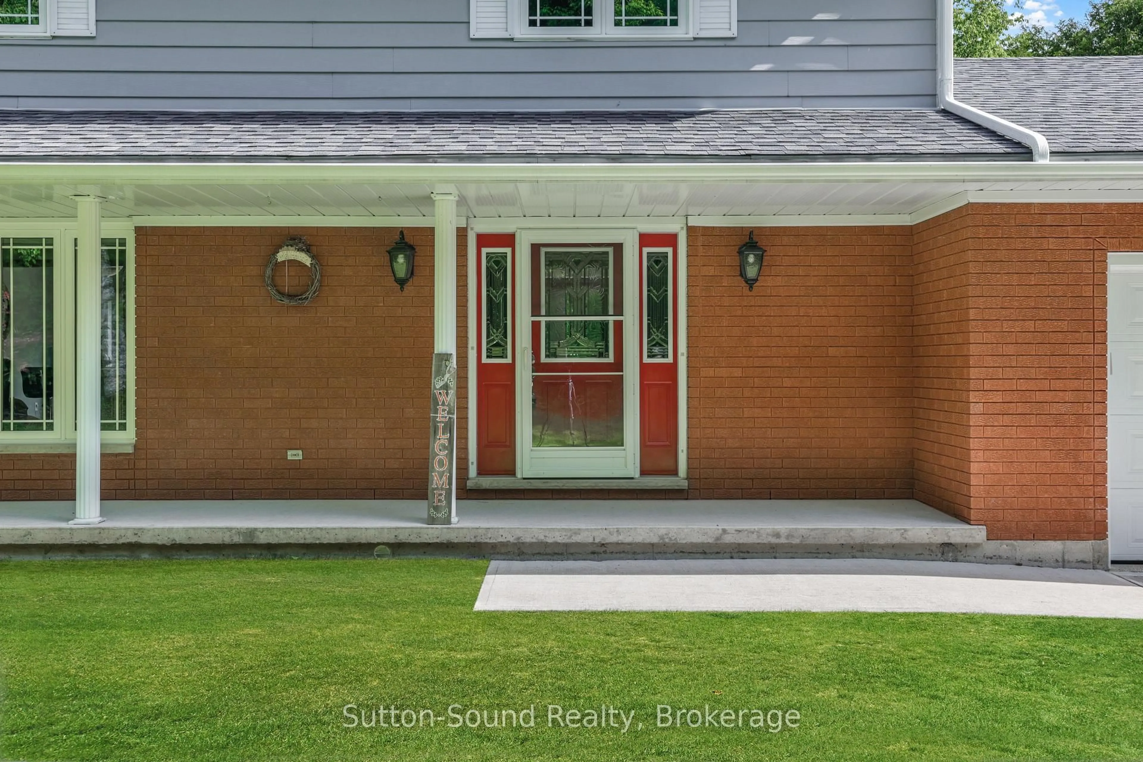 Home with brick exterior material, street for 200065 10 Sdrd, Georgian Bluffs Ontario N0H 2K0