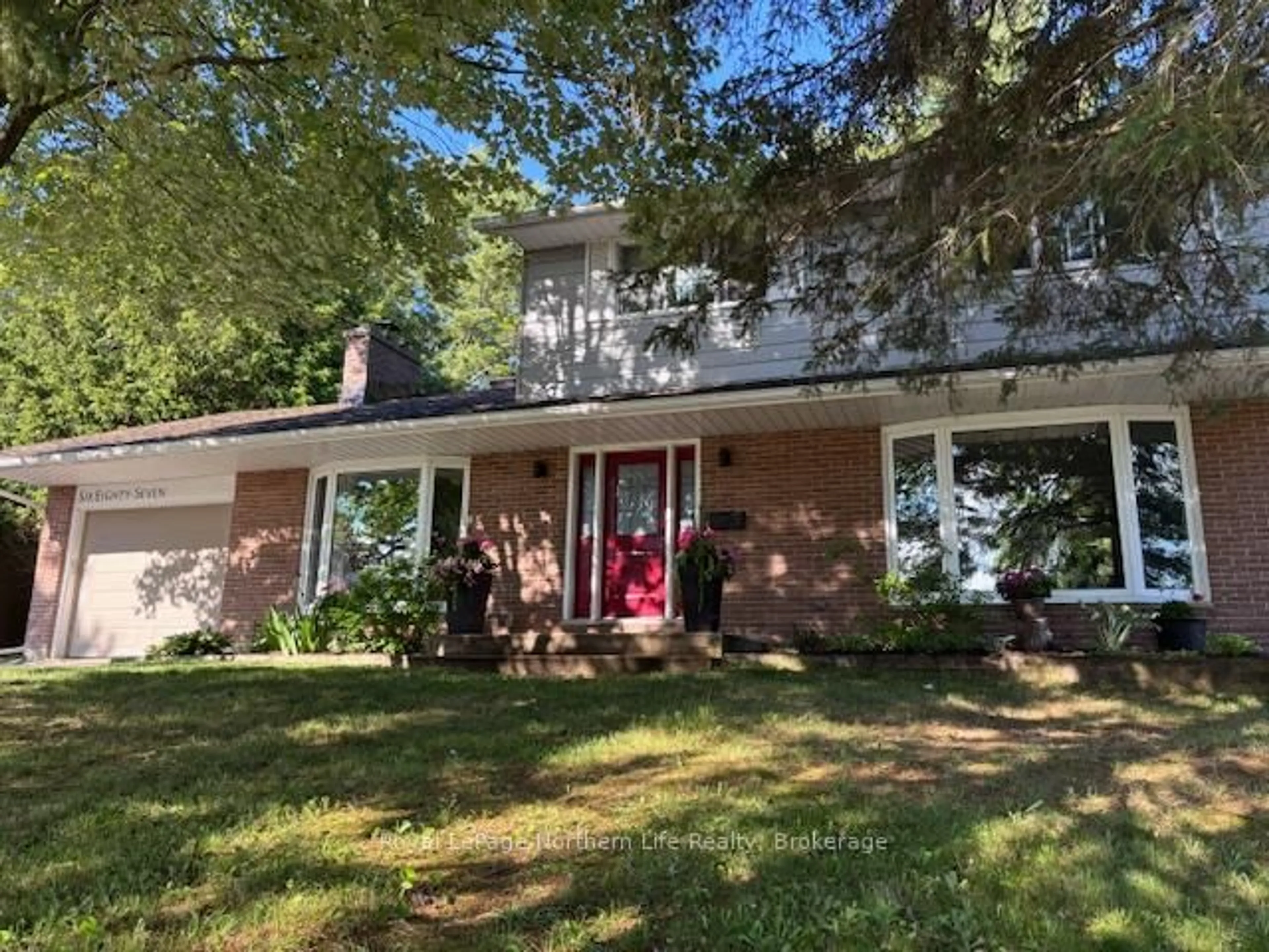Home with brick exterior material, street for 687 Guinevere Crt, North Bay Ontario P1A 3M1