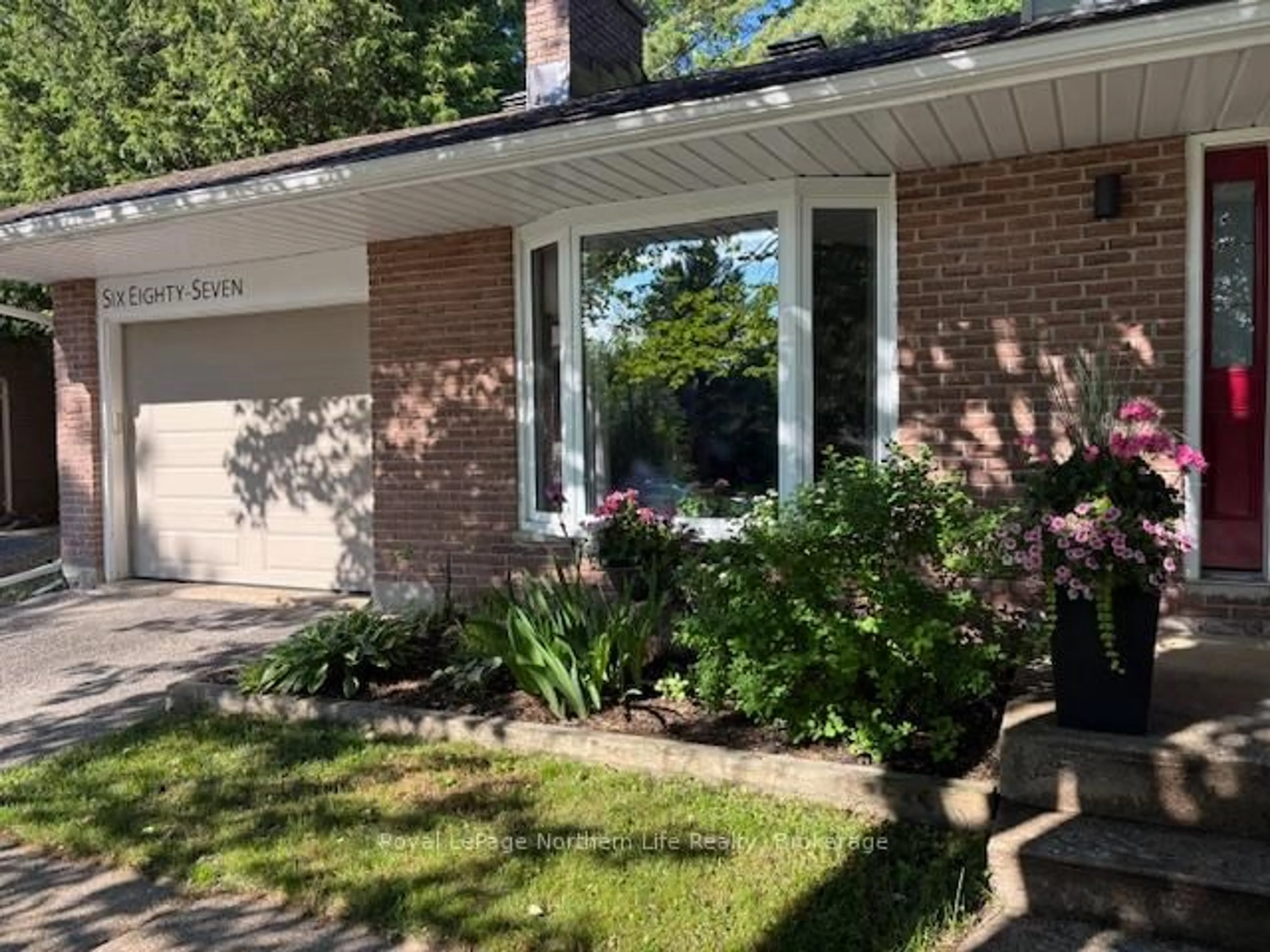 Home with brick exterior material, street for 687 Guinevere Crt, North Bay Ontario P1A 3M1