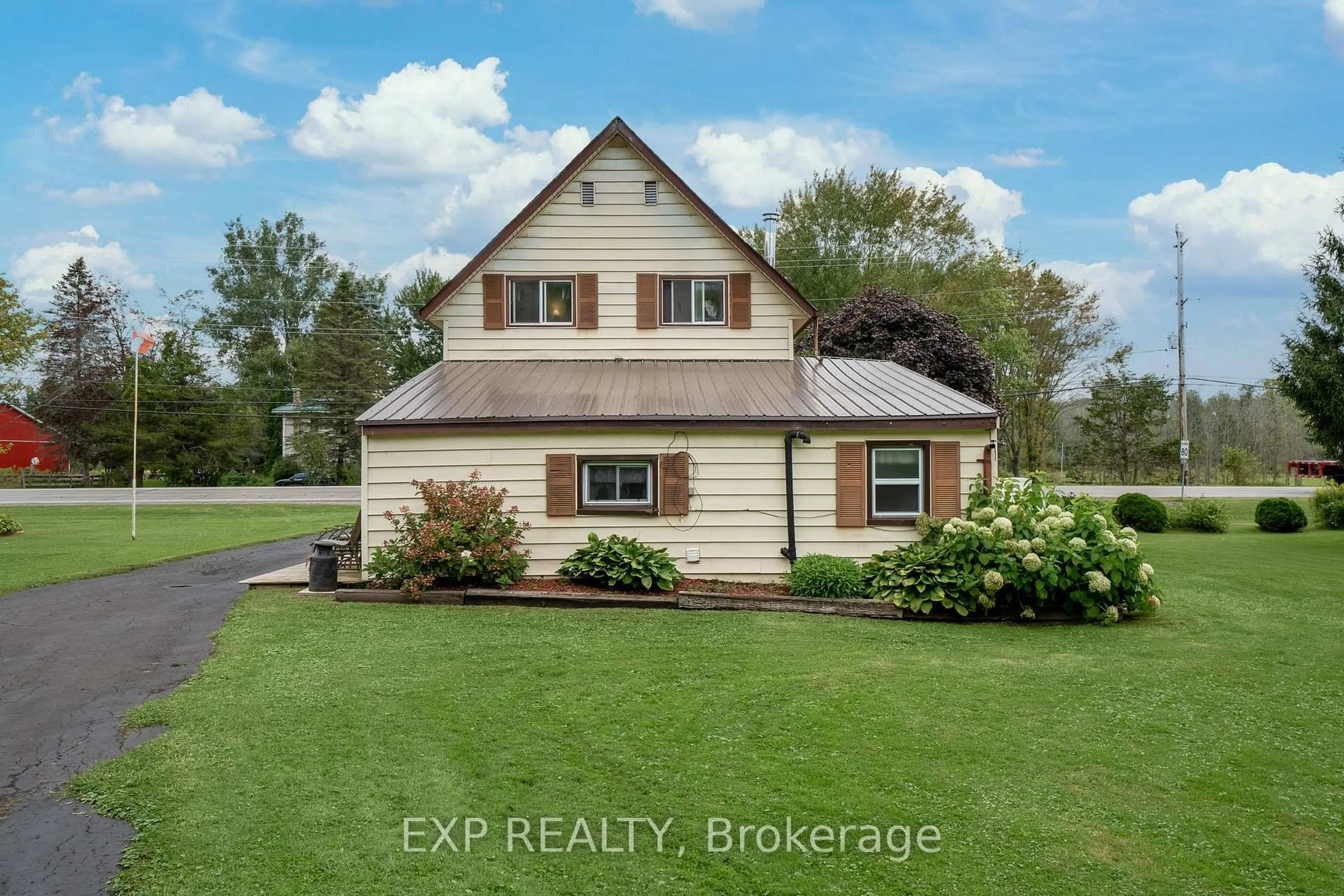 A pic from outside/outdoor area/front of a property/back of a property/a pic from drone, water/lake/river/ocean view for 21331 Loyalist Pkwy, Prince Edward County Ontario K0K 1L0