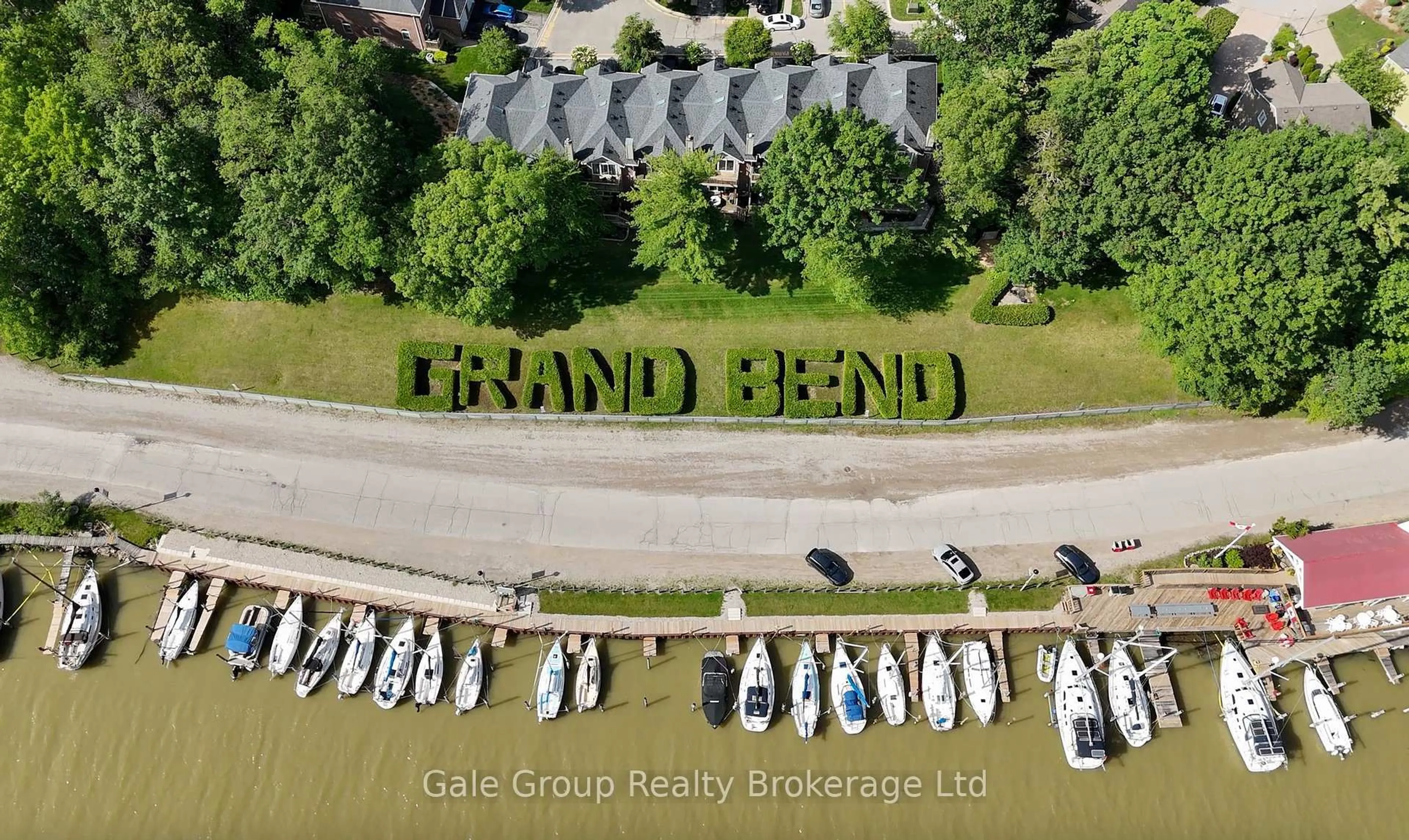 A pic from outside/outdoor area/front of a property/back of a property/a pic from drone, water/lake/river/ocean view for 26 Woodward Ave, Lambton Shores Ontario N0M 1T0