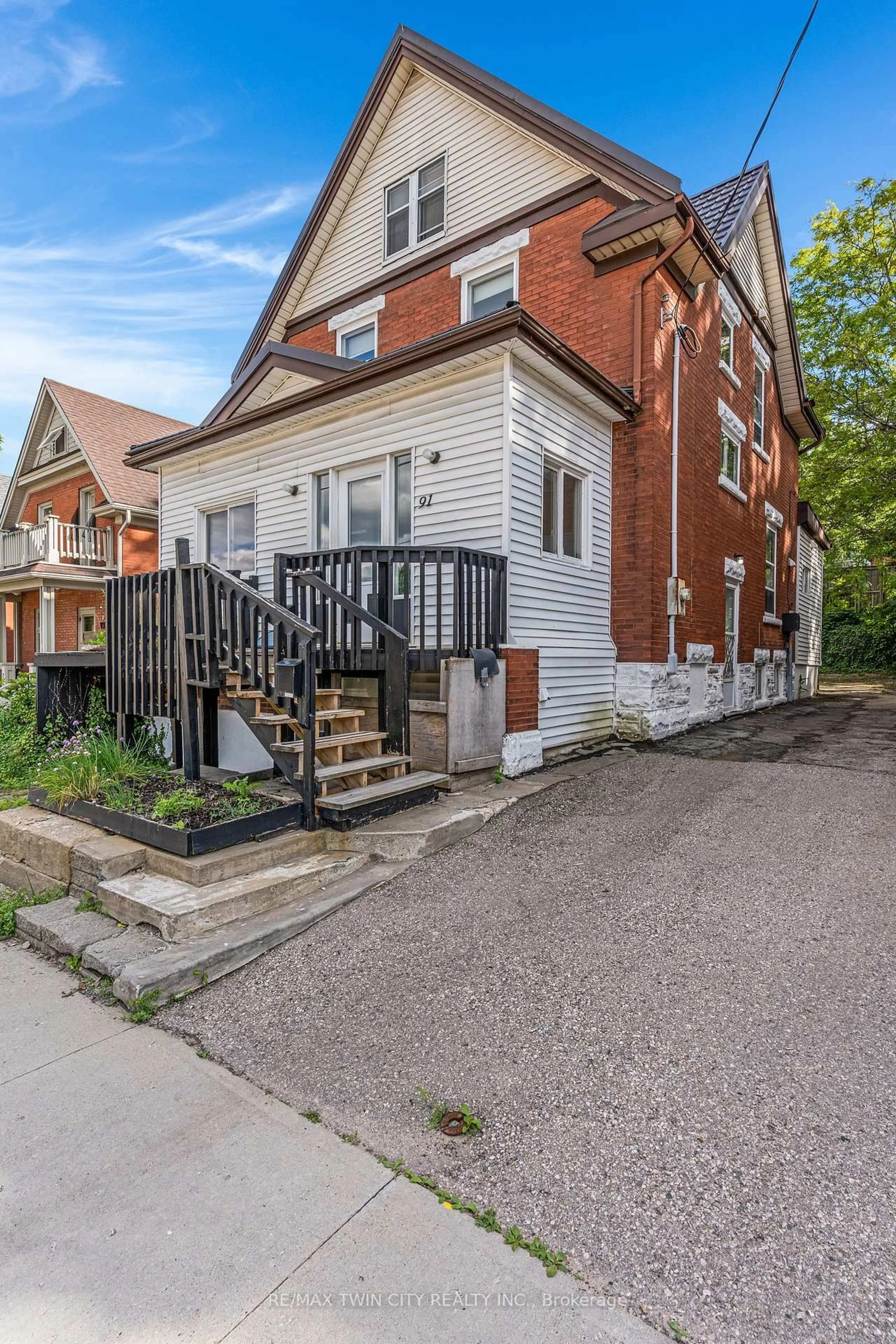 Home with brick exterior material, street for 91 Charles St, Kitchener Ontario N2G 2P5