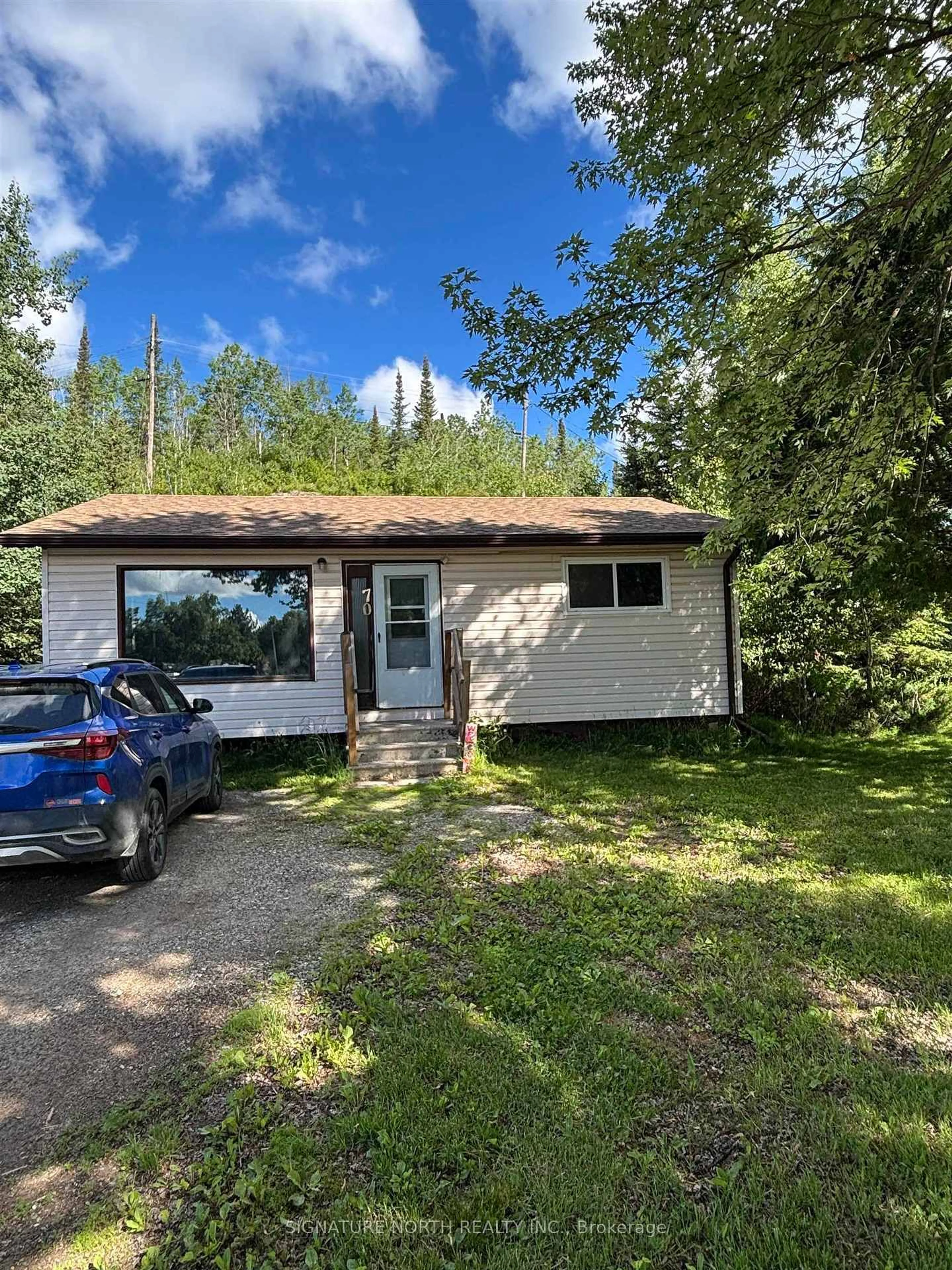 A pic from outside/outdoor area/front of a property/back of a property/a pic from drone, unknown for 70 Maple Crescent, Atikokan Ontario P0T 1C0