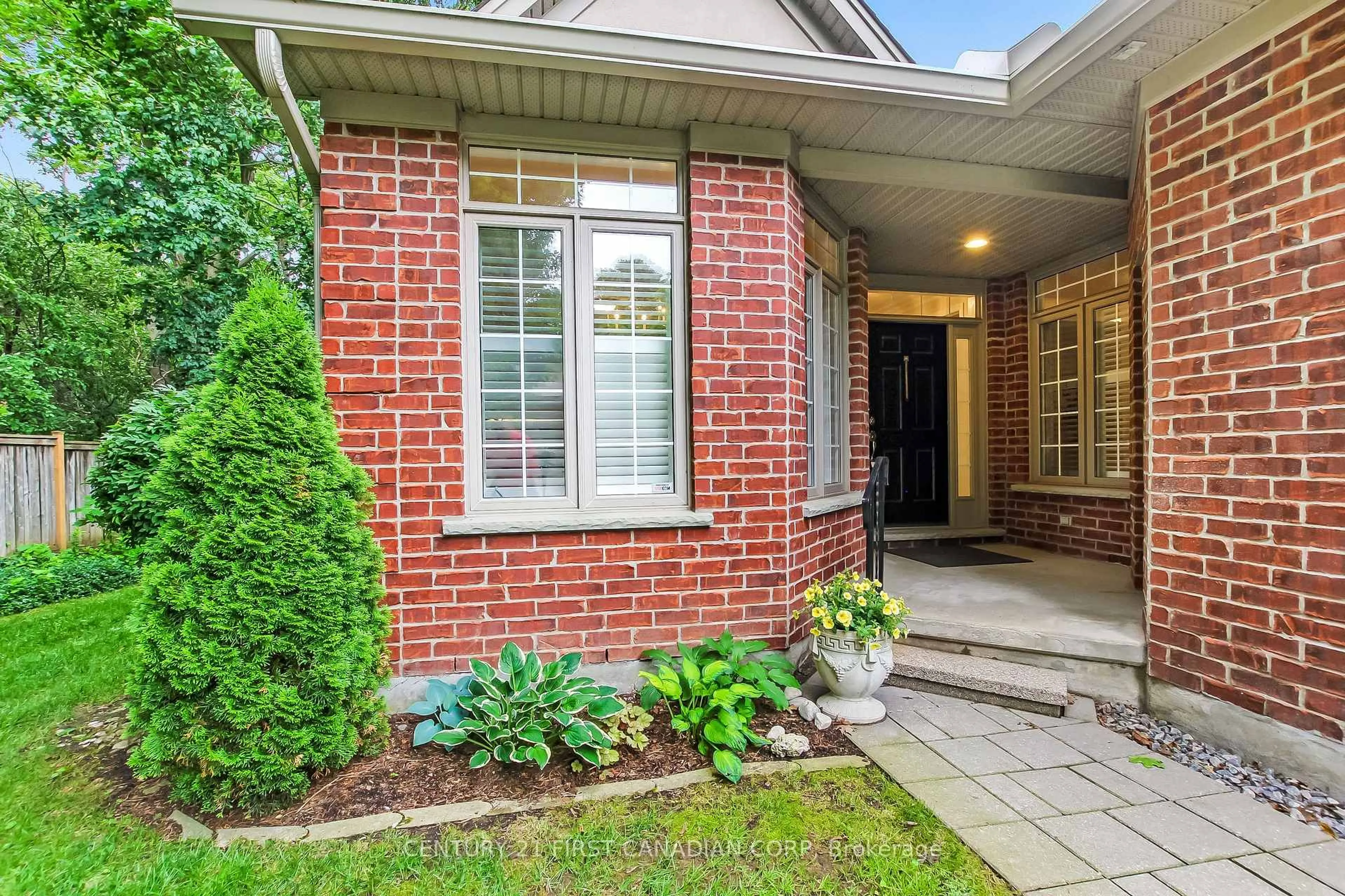 Home with brick exterior material, street for 417 Hyde Park Rd #11, London North Ontario N6H 3R9