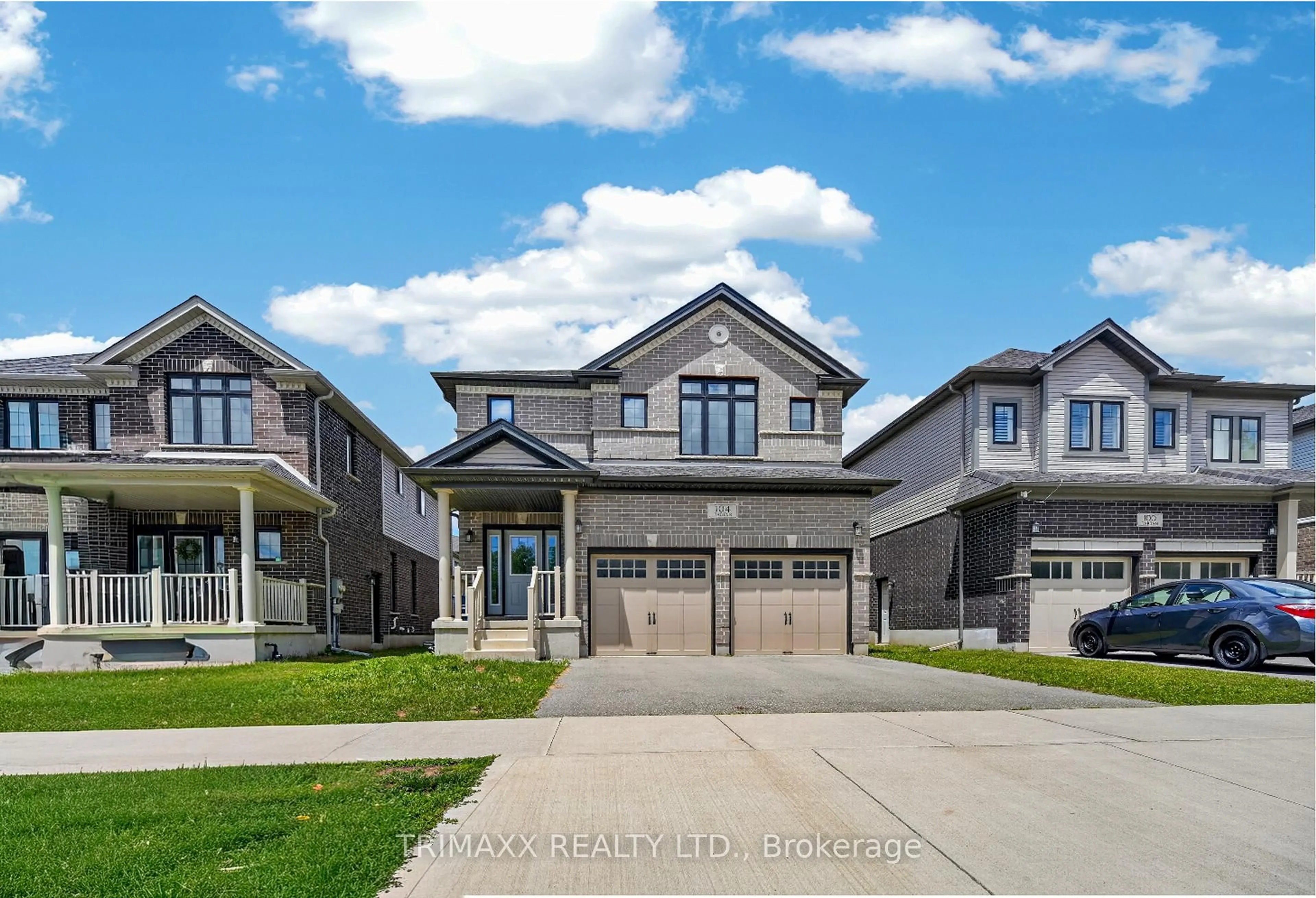 Home with vinyl exterior material, street for 104 Tartan Ave, Kitchener Ontario N2R 1R7