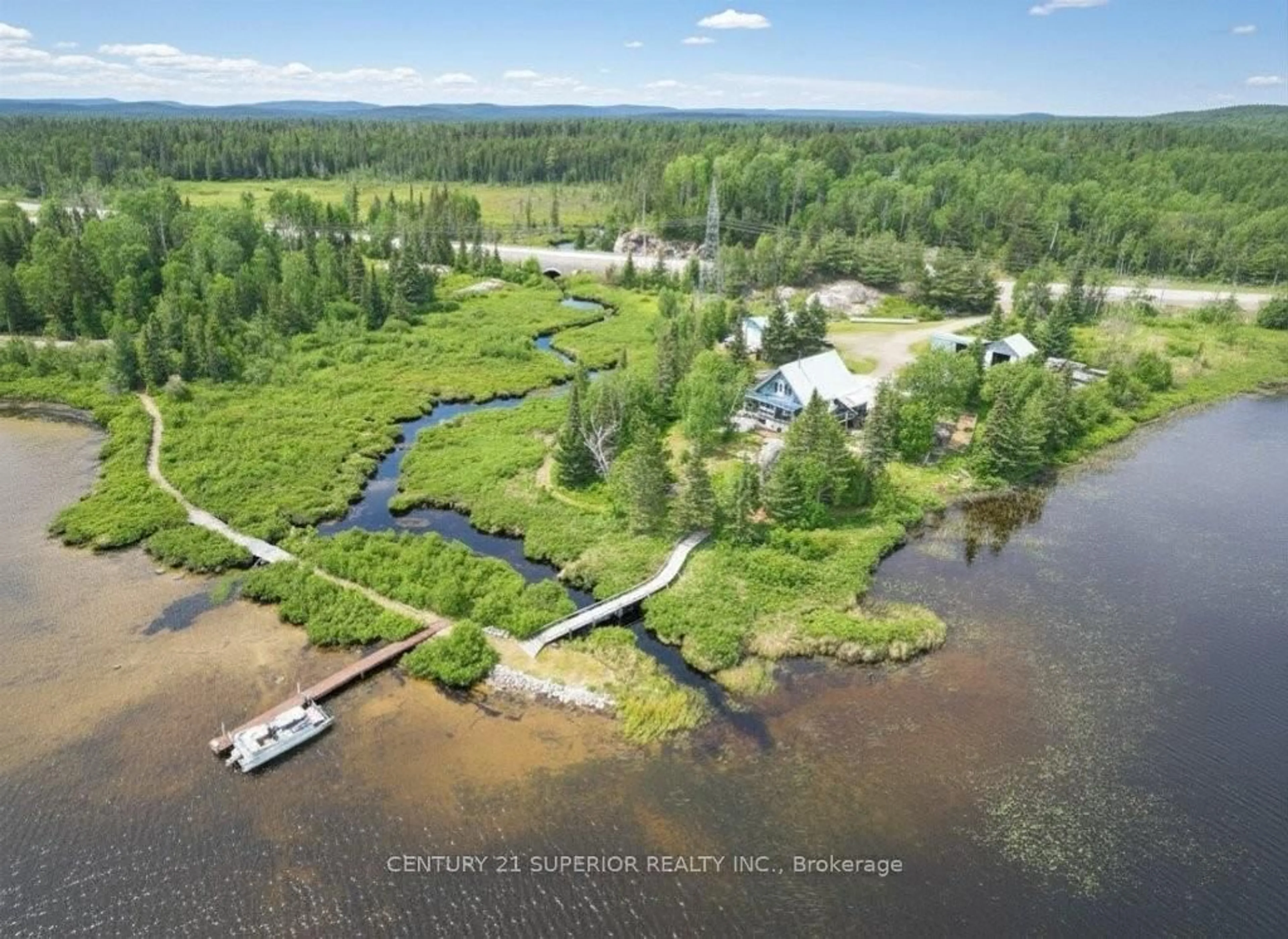 A pic from outside/outdoor area/front of a property/back of a property/a pic from drone, water/lake/river/ocean view for 2131 HWY 11, Rainy River Remote Area Ontario P0T 1C0