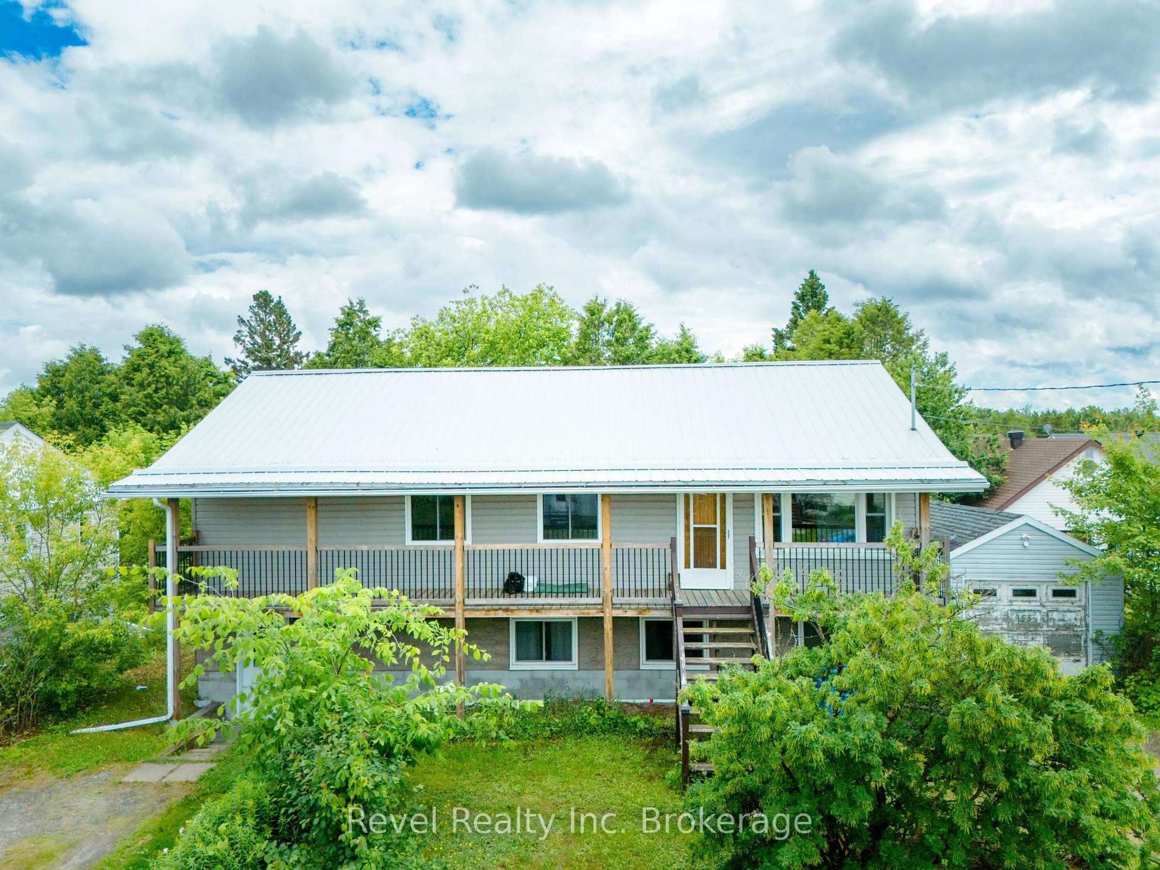 A pic from outside/outdoor area/front of a property/back of a property/a pic from drone, unknown for 355 Angus Ave, North Bay Ontario P1B 7L7