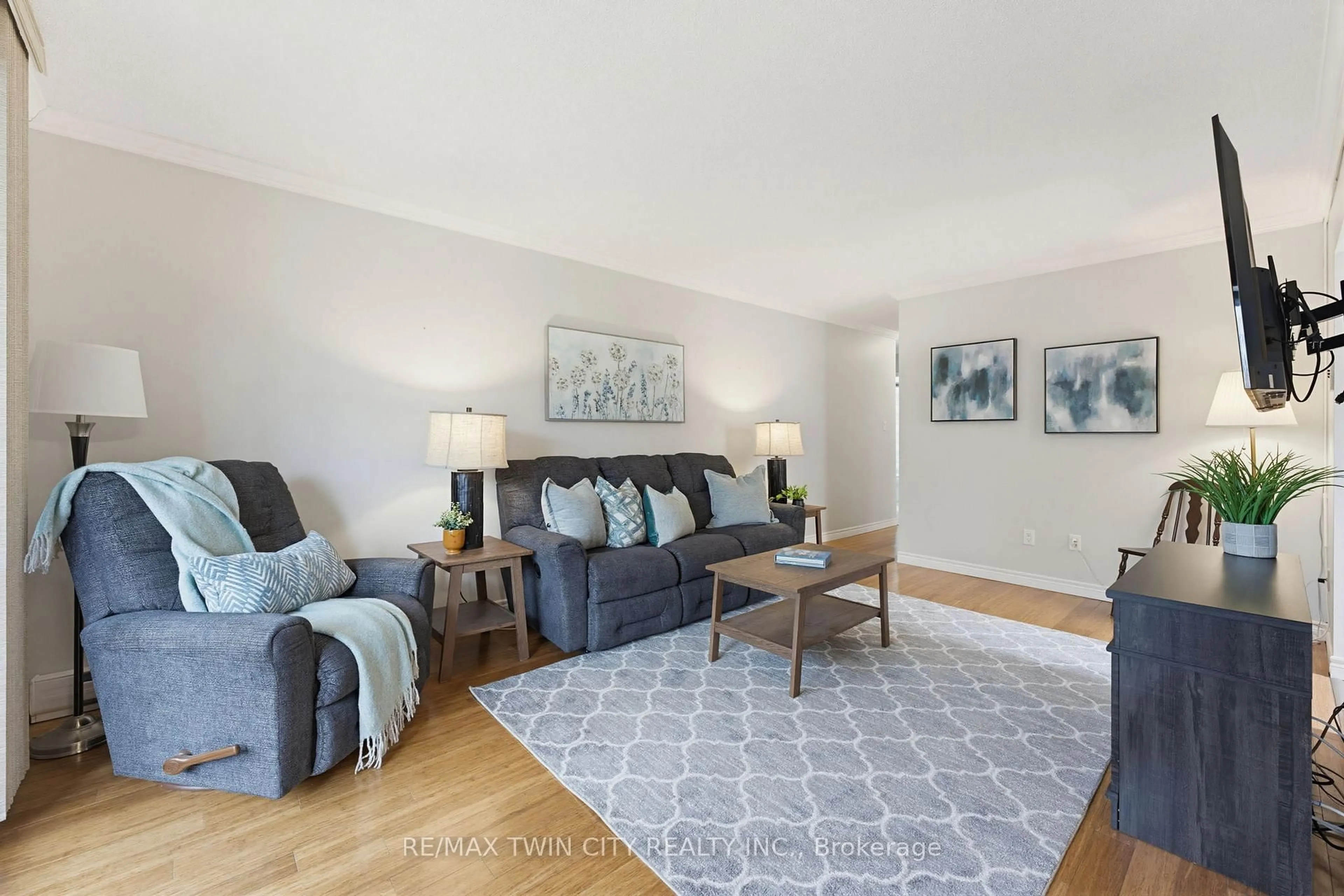Living room with furniture, unknown for 23 Main St #203, Hamilton Ontario L9H 2P7