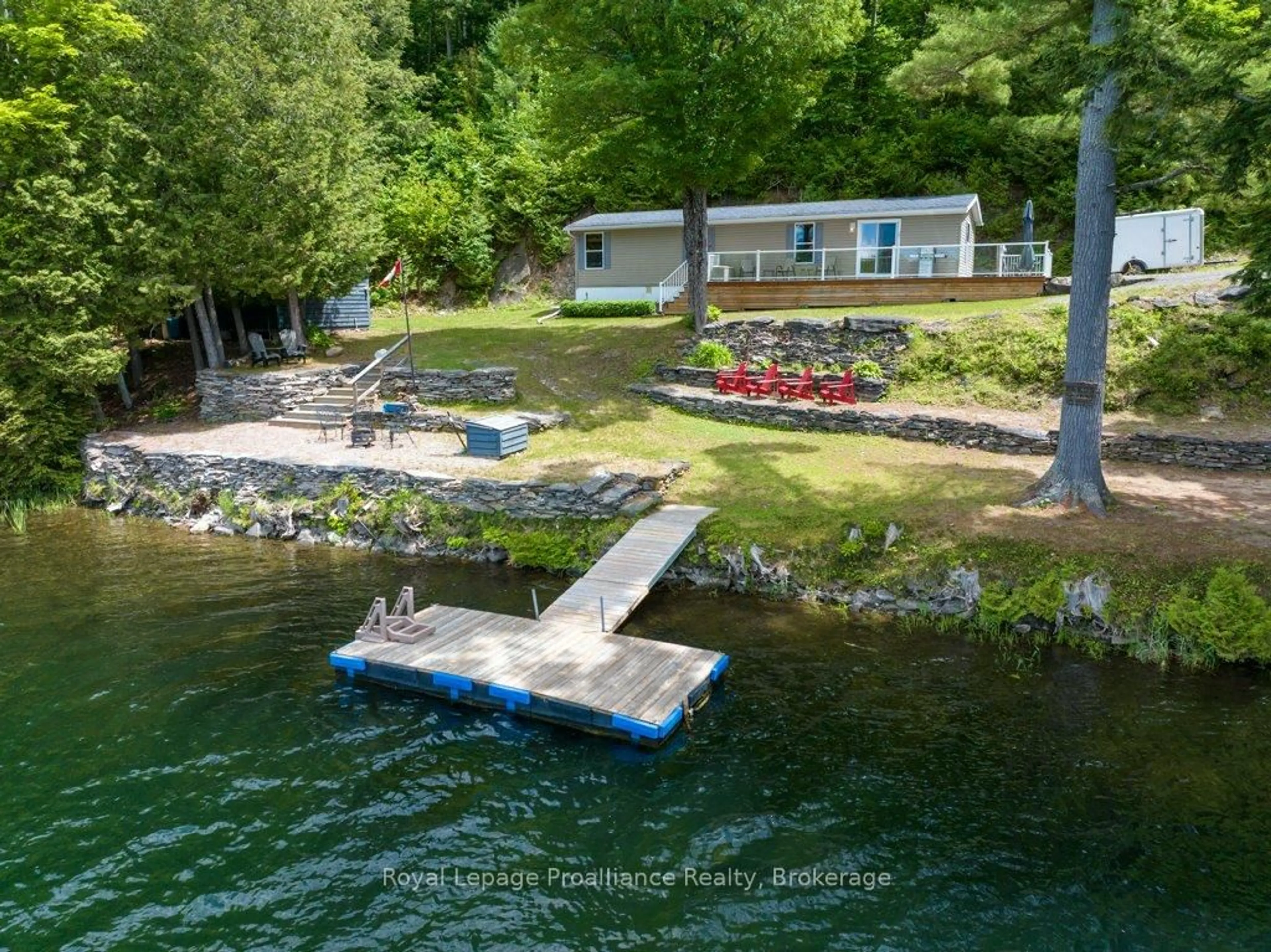 A pic from outside/outdoor area/front of a property/back of a property/a pic from drone, water/lake/river/ocean view for 1047A Little Miss Lane, Cloyne Ontario K0H 1K0