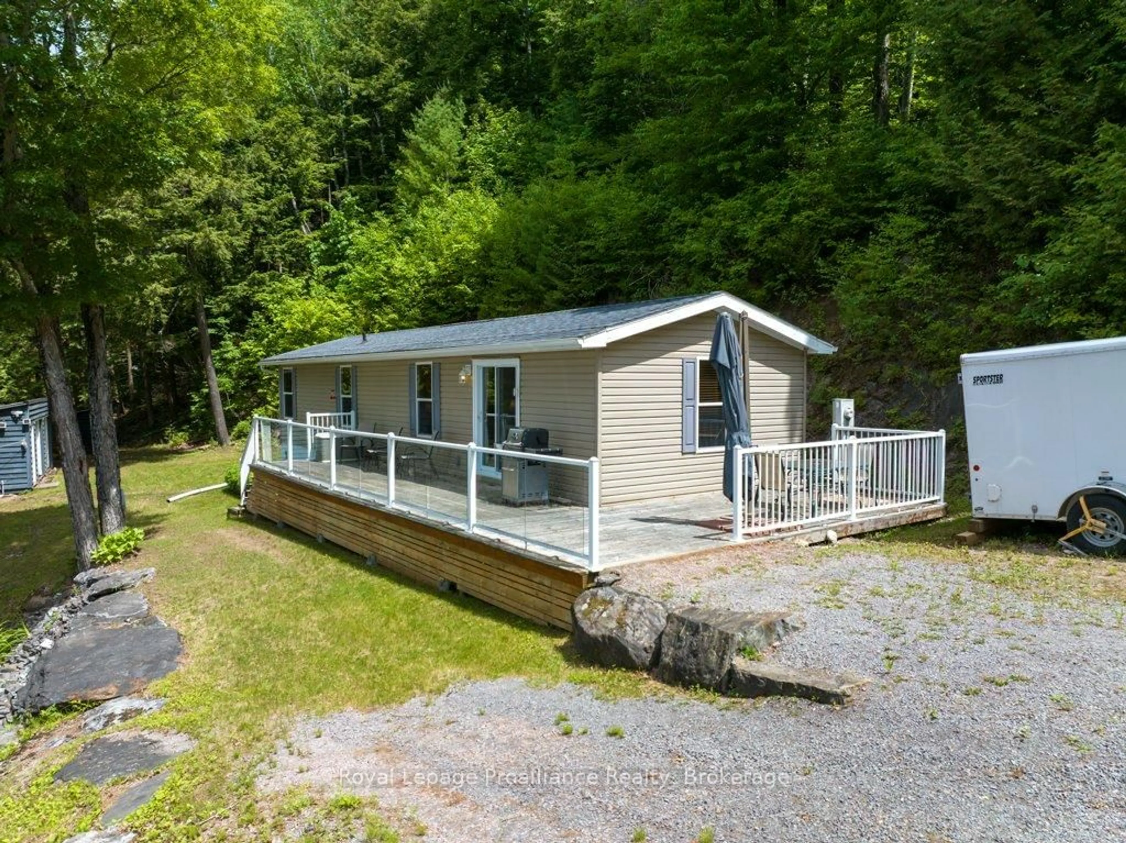 A pic from outside/outdoor area/front of a property/back of a property/a pic from drone, water/lake/river/ocean view for 1047A Little Miss Lane, Cloyne Ontario K0H 1K0