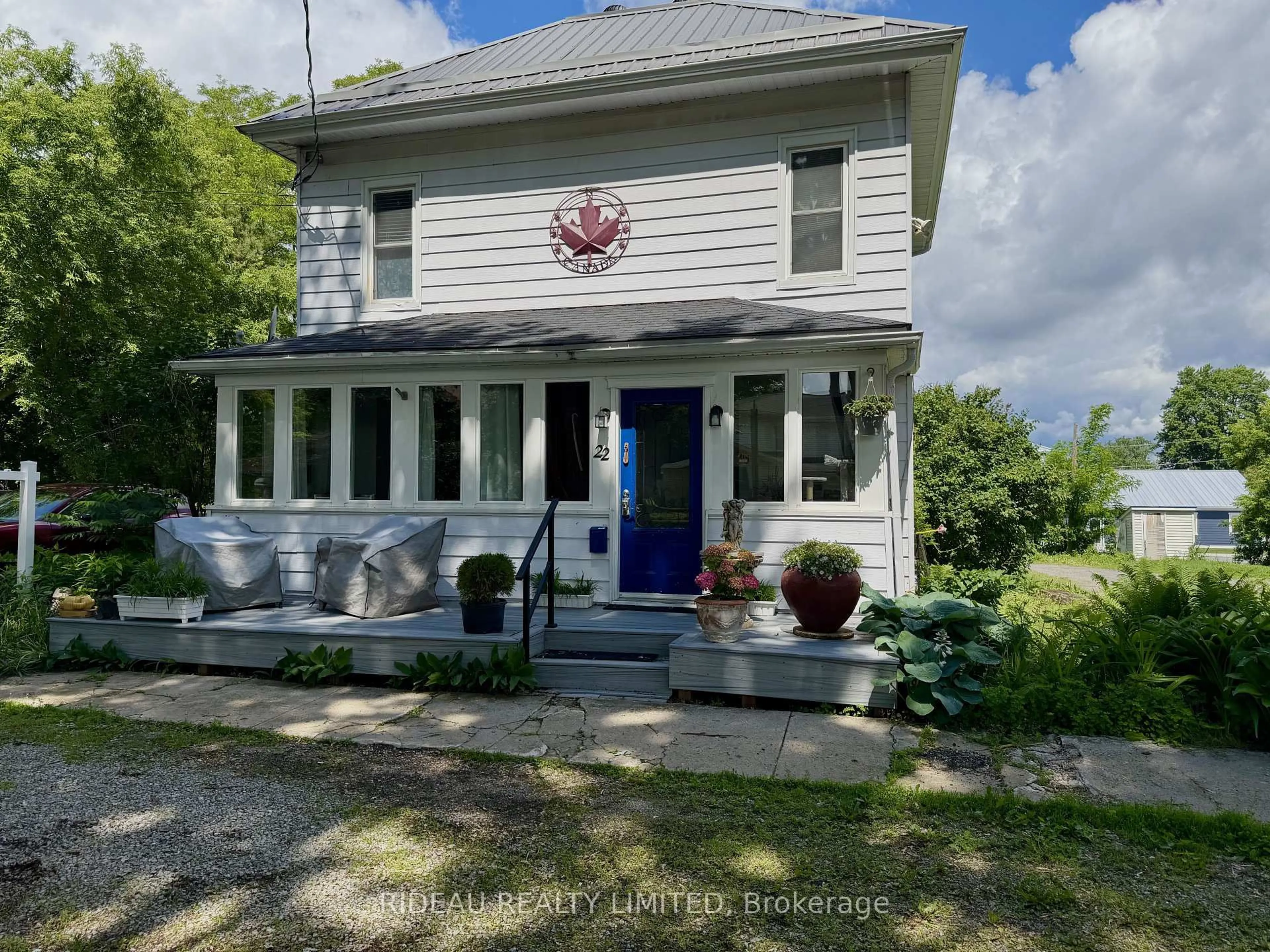 A pic from outside/outdoor area/front of a property/back of a property/a pic from drone, street for 22 Perth St, Rideau Lakes Ontario K0G 1V0
