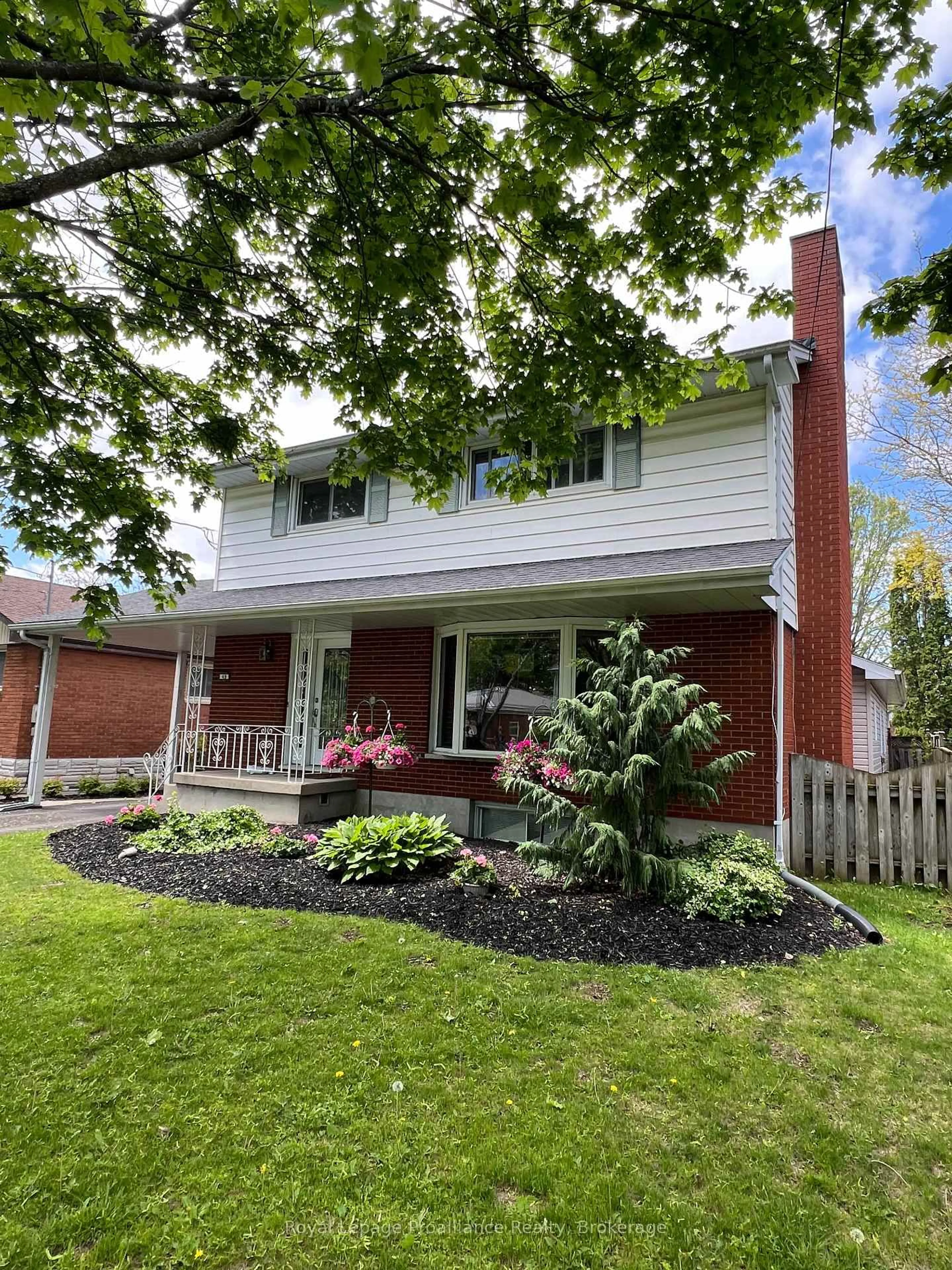 Home with brick exterior material, street for 49 Plaza Sq, Belleville Ontario K8N 4J2