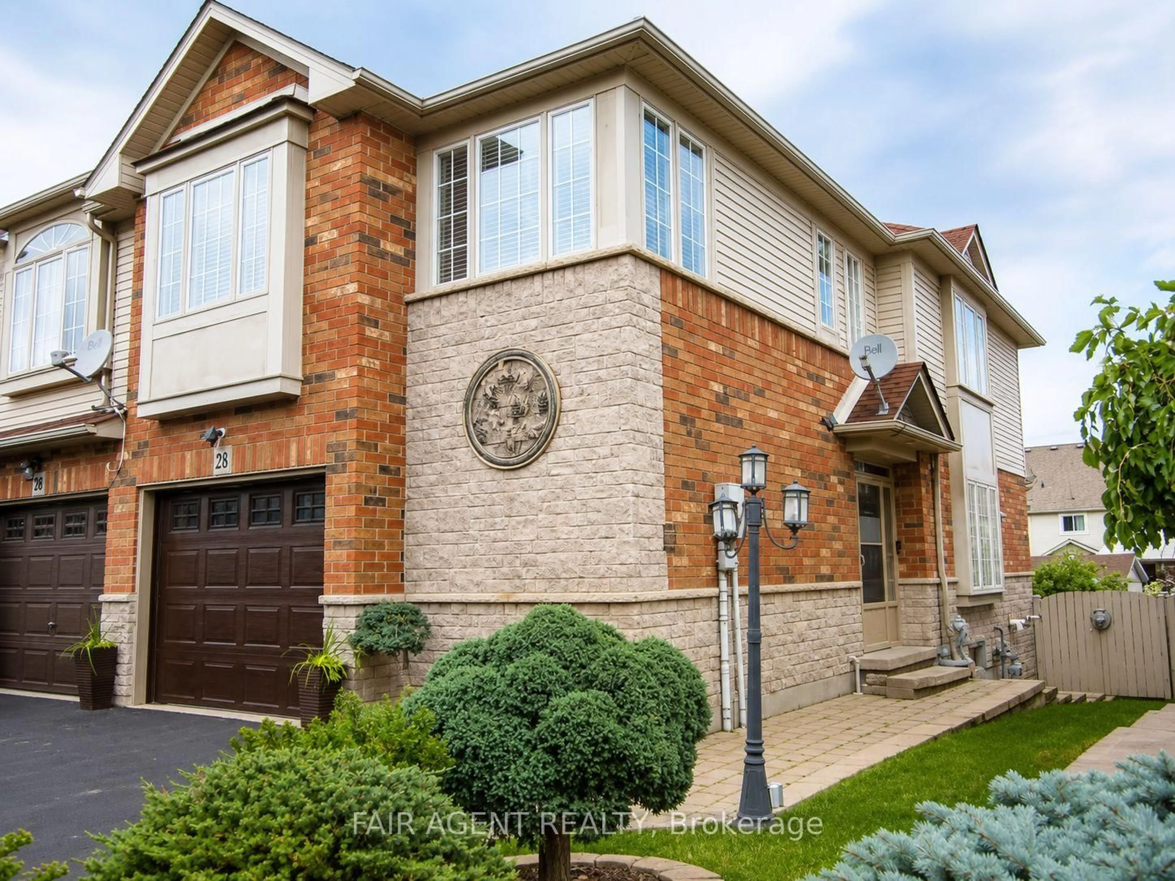 Home with brick exterior material, street for 28 Elderberry Ave, Grimsby Ontario L3M 5R5