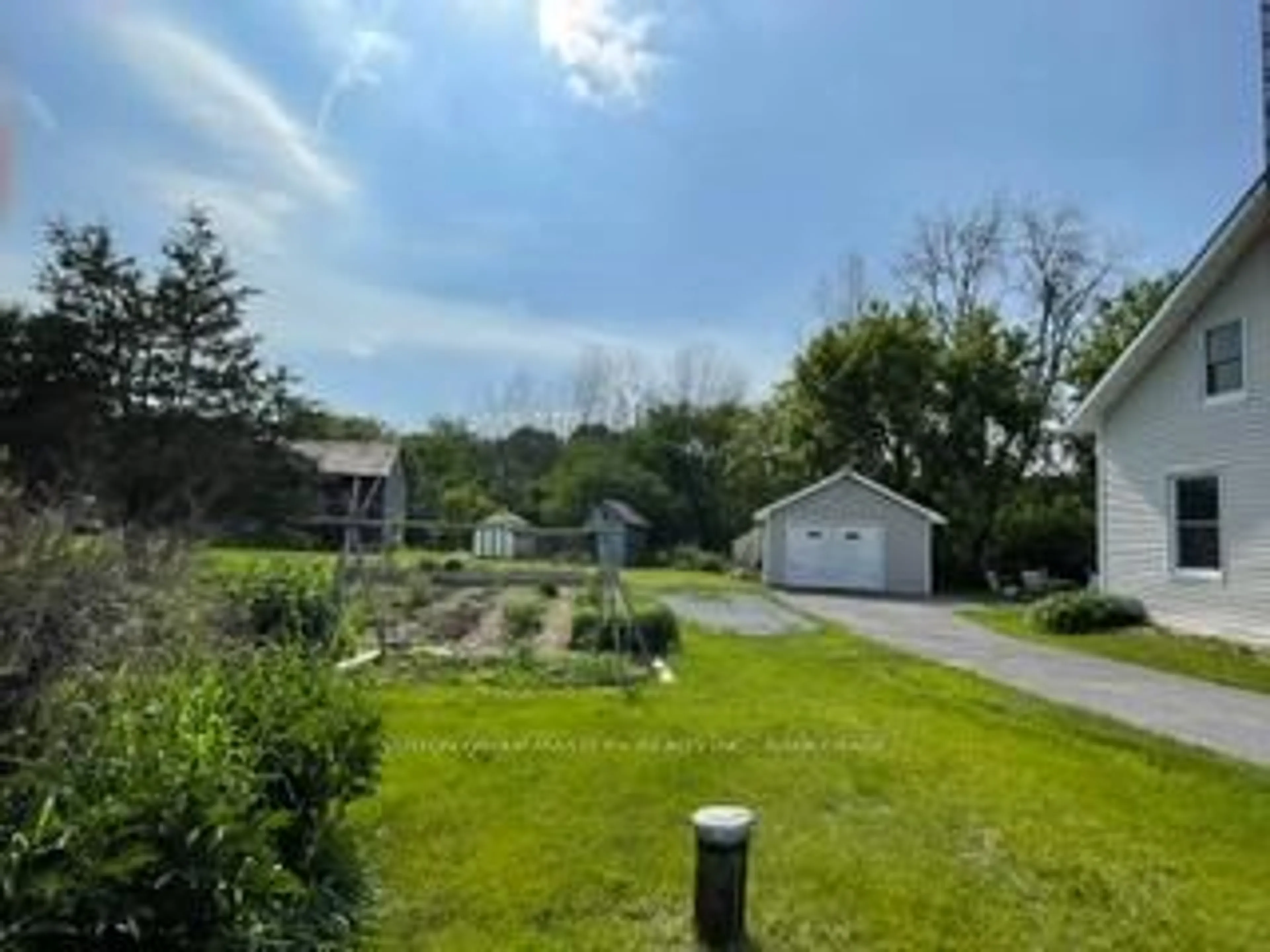 A pic from outside/outdoor area/front of a property/back of a property/a pic from drone, unknown for 3481 Wilton Rd, Harrowsmith Ontario K0H 1V0