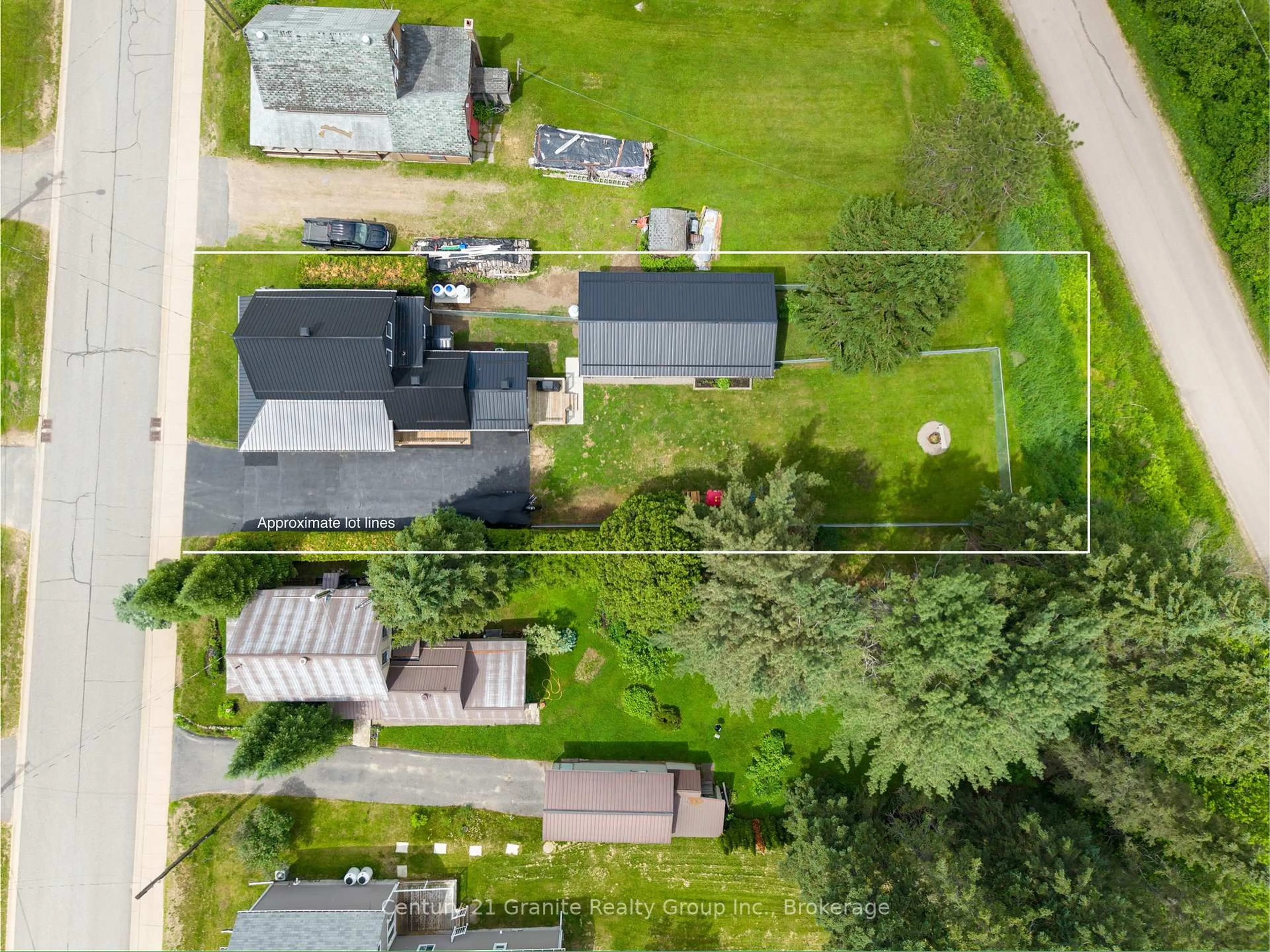 A pic from outside/outdoor area/front of a property/back of a property/a pic from drone, street for 25 Post St, South Algonquin Ontario K0J 2M0