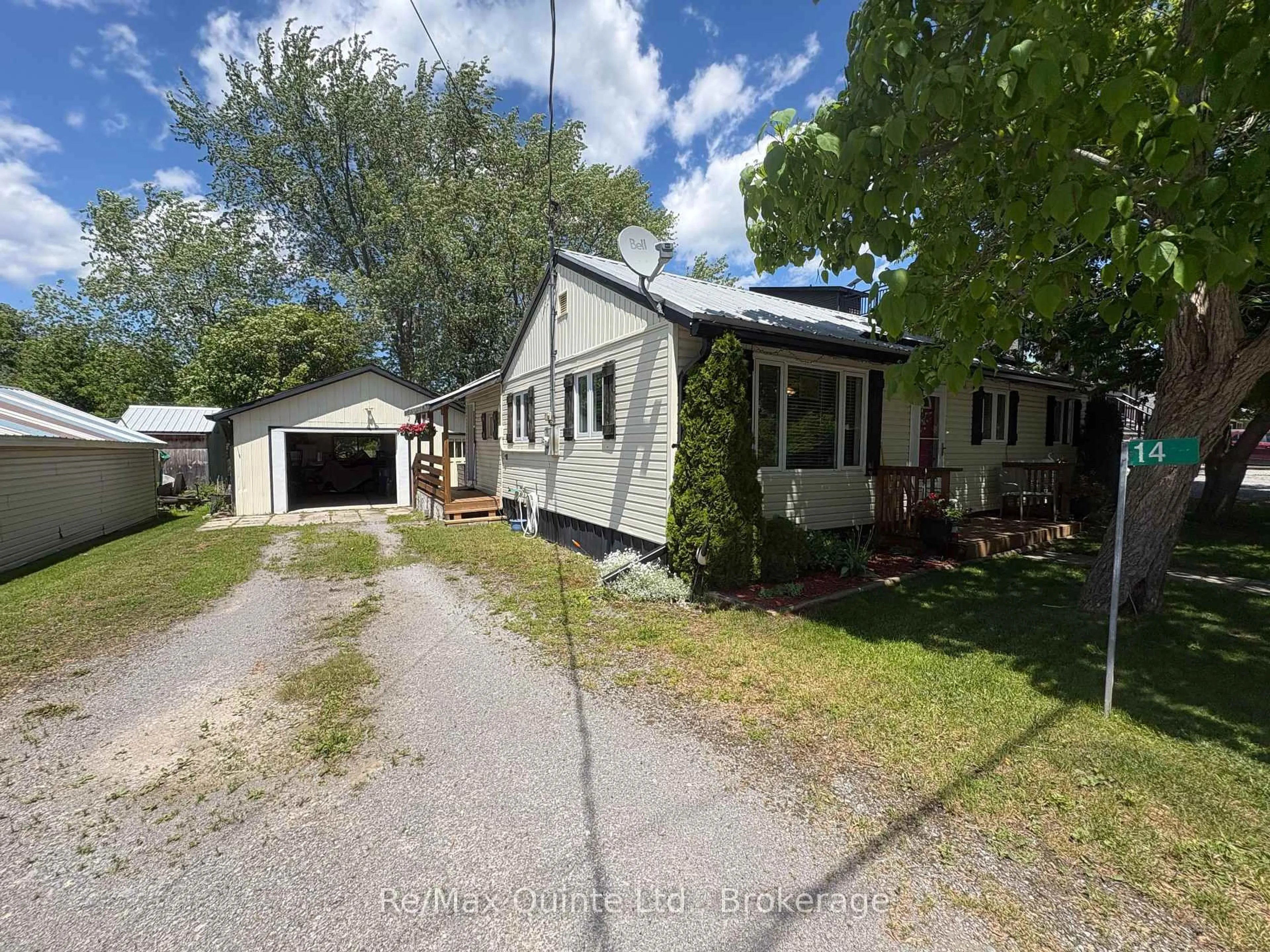 A pic from outside/outdoor area/front of a property/back of a property/a pic from drone, street for 14 Bay Ave, Prince Edward County Ontario K0K 1T0